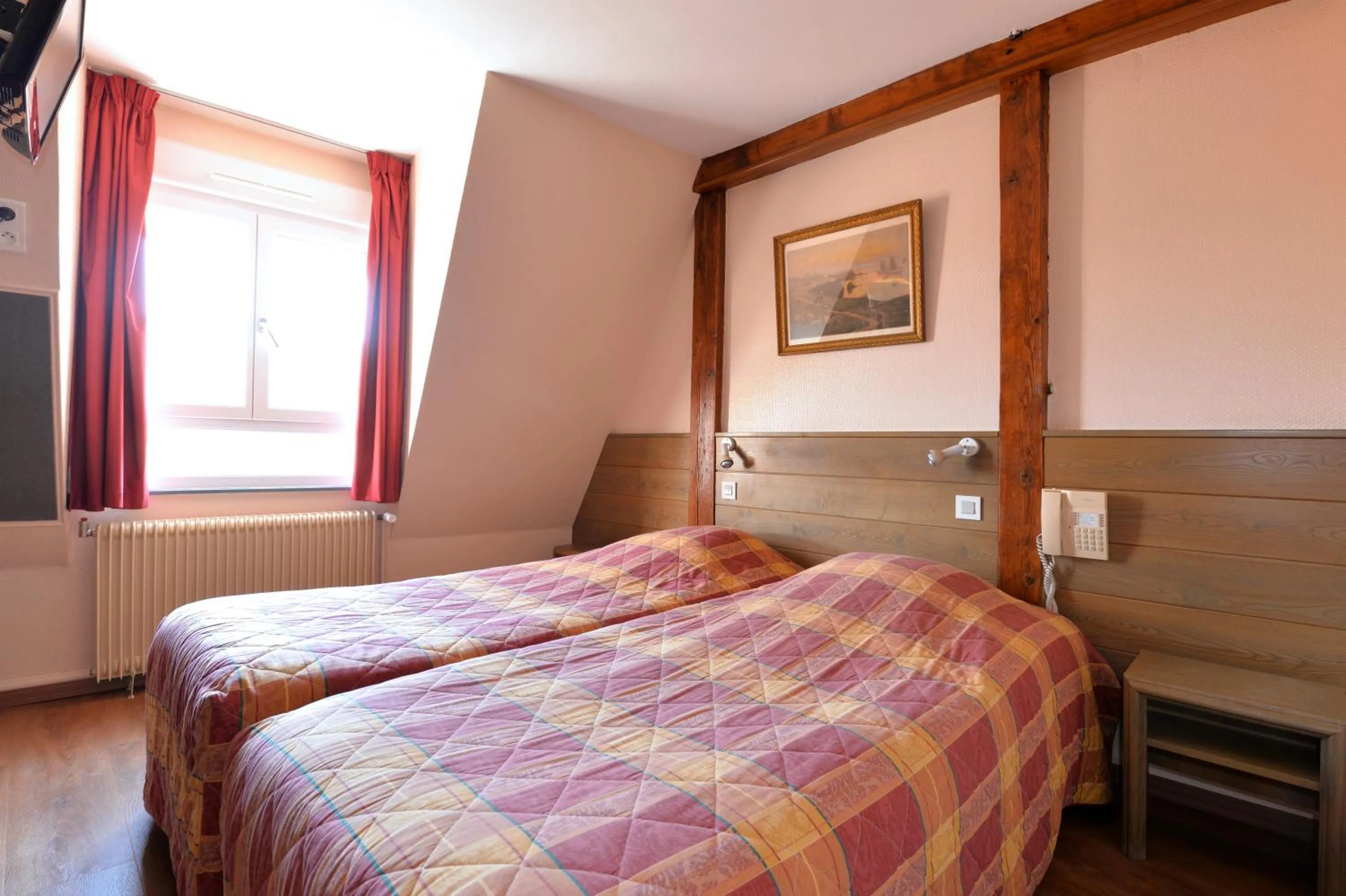 Bed in Hotel Restaurant Dontenville