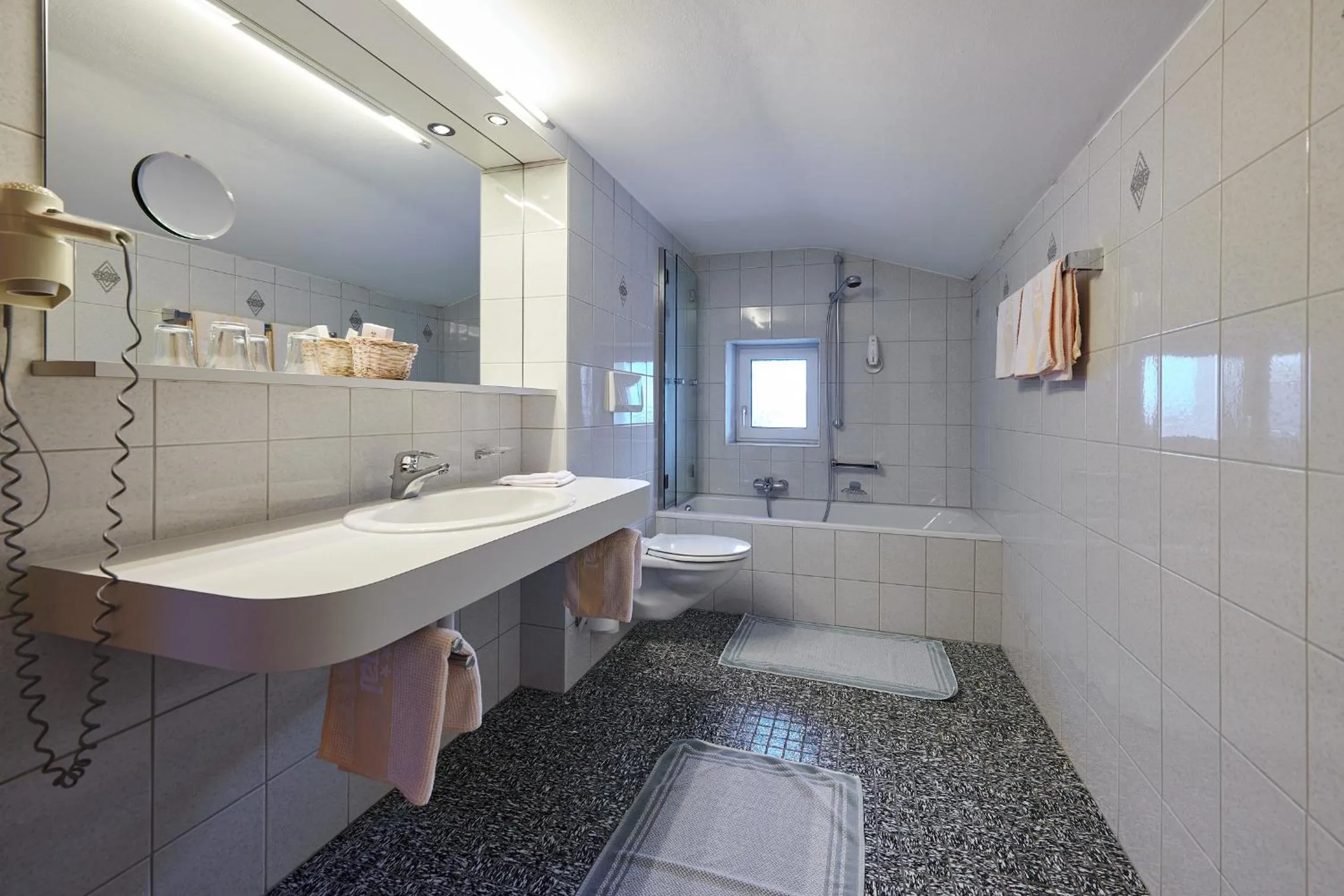 Bathroom in Hotel Appartement Roggal