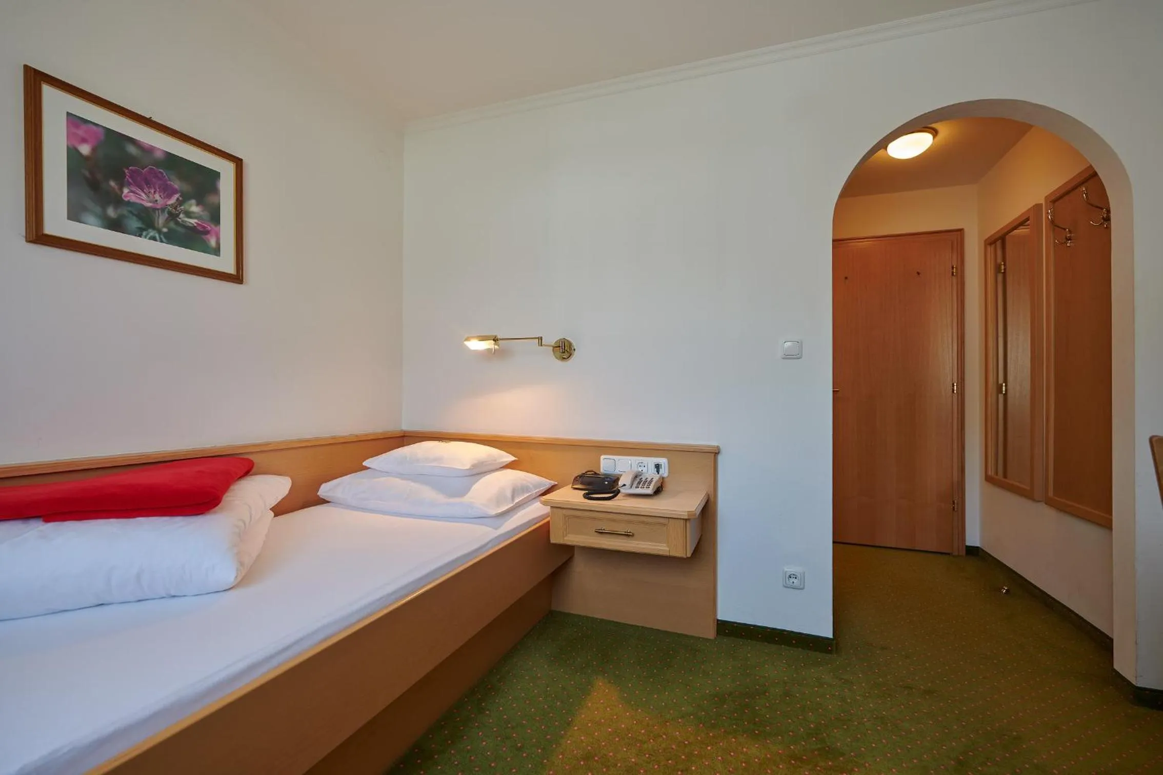 Bed in Hotel Appartement Roggal