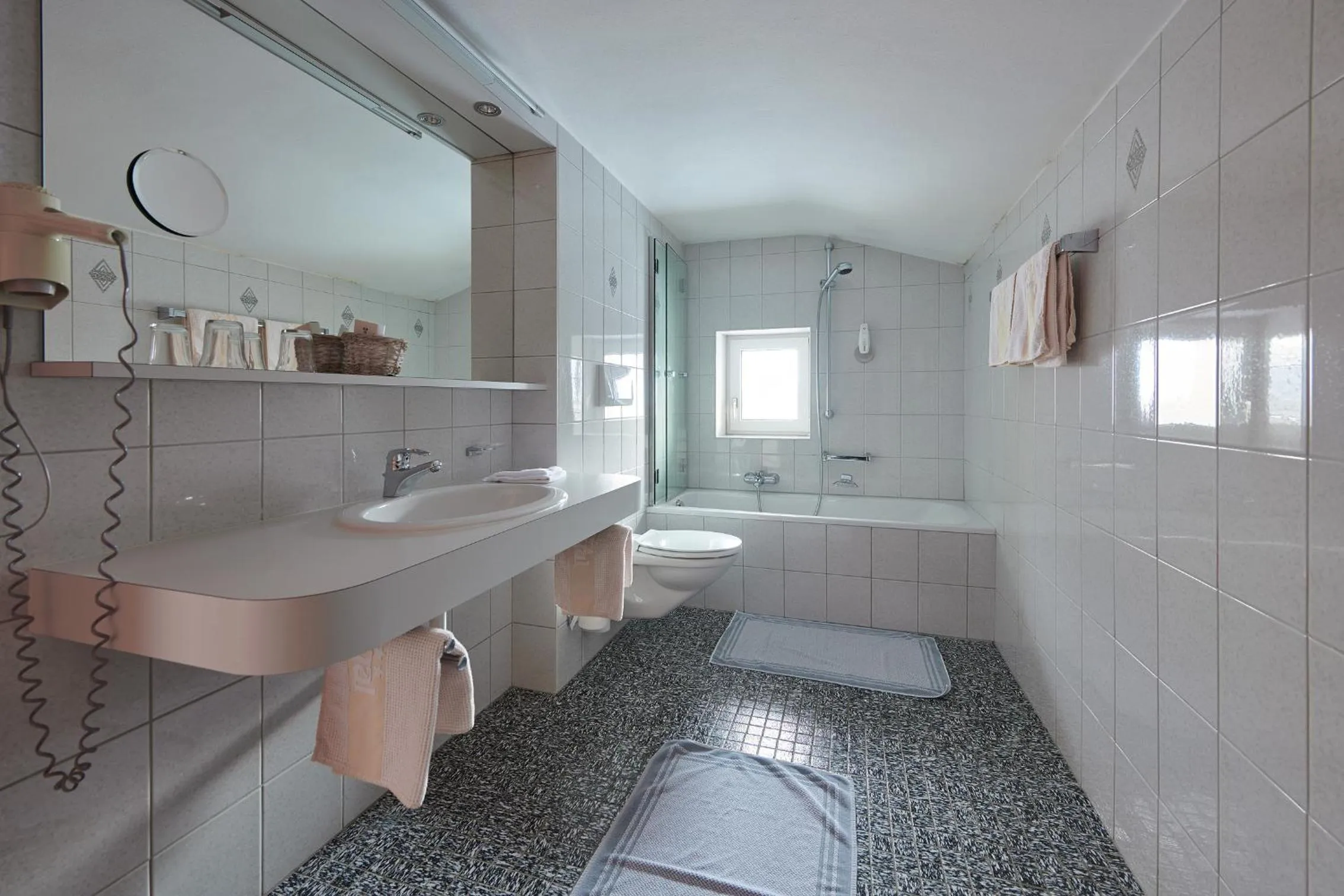 Bathroom in Hotel Appartement Roggal