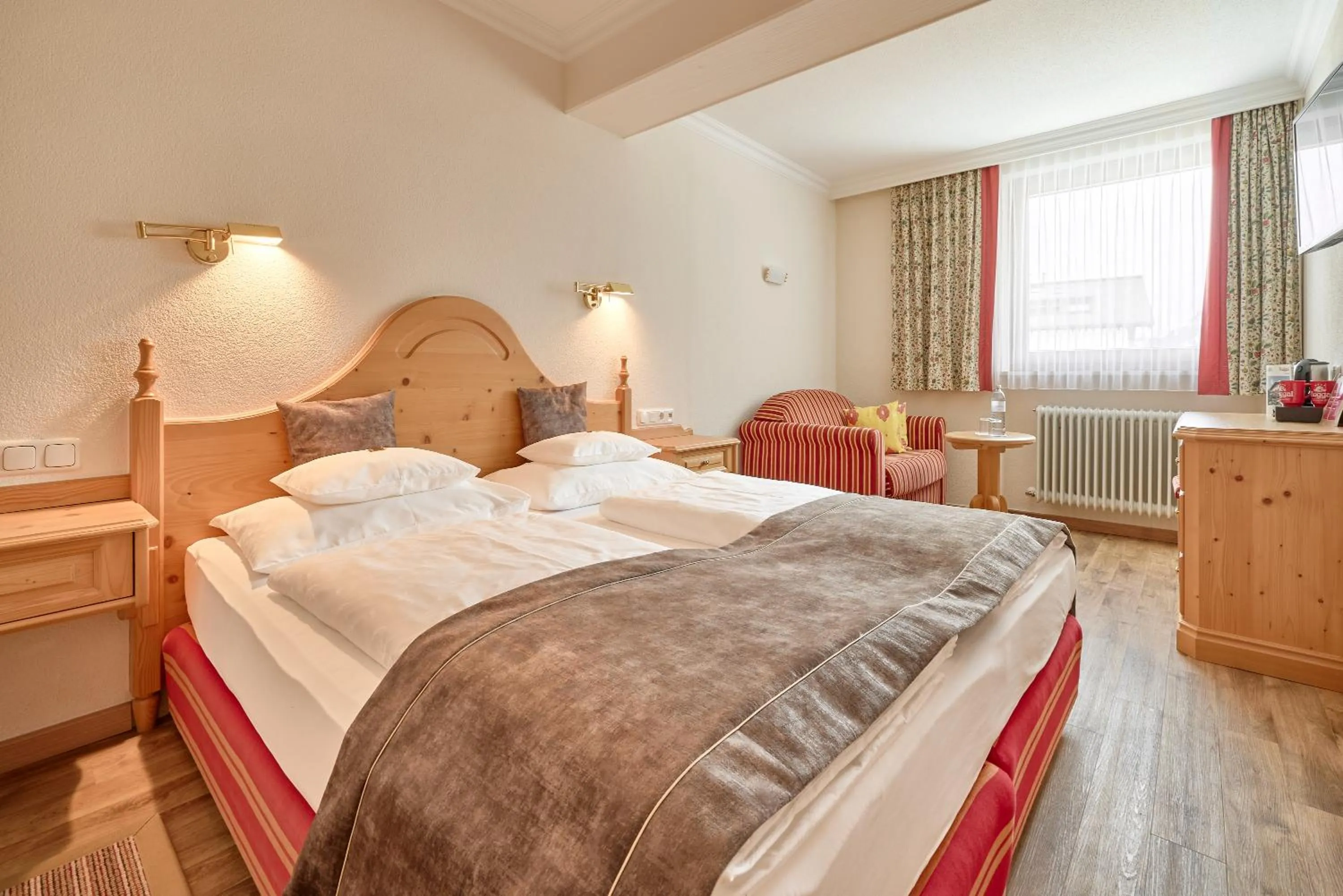 Bed in Hotel Appartement Roggal