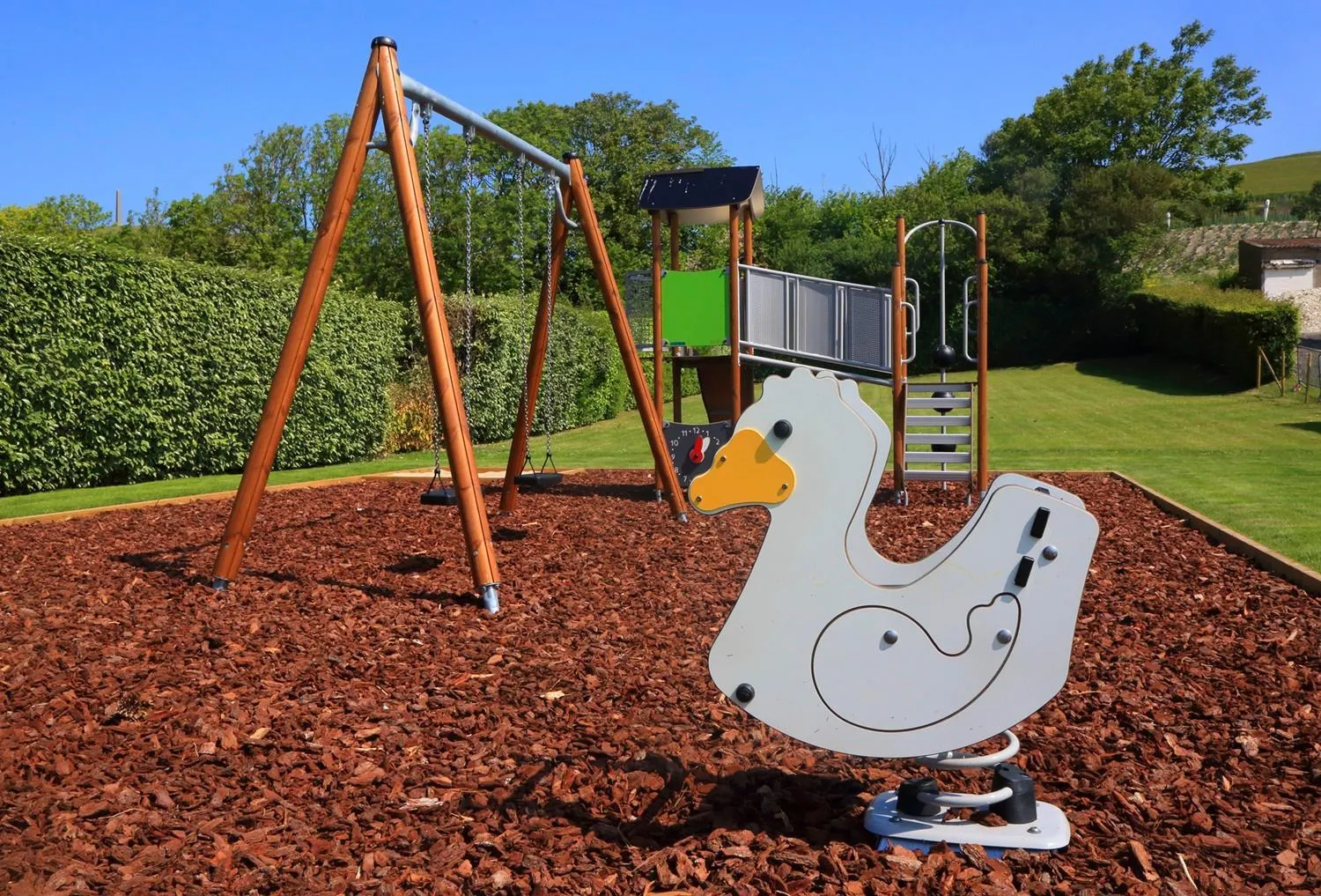 Children play ground in Hôtel L'Escale - Piscine & SPA