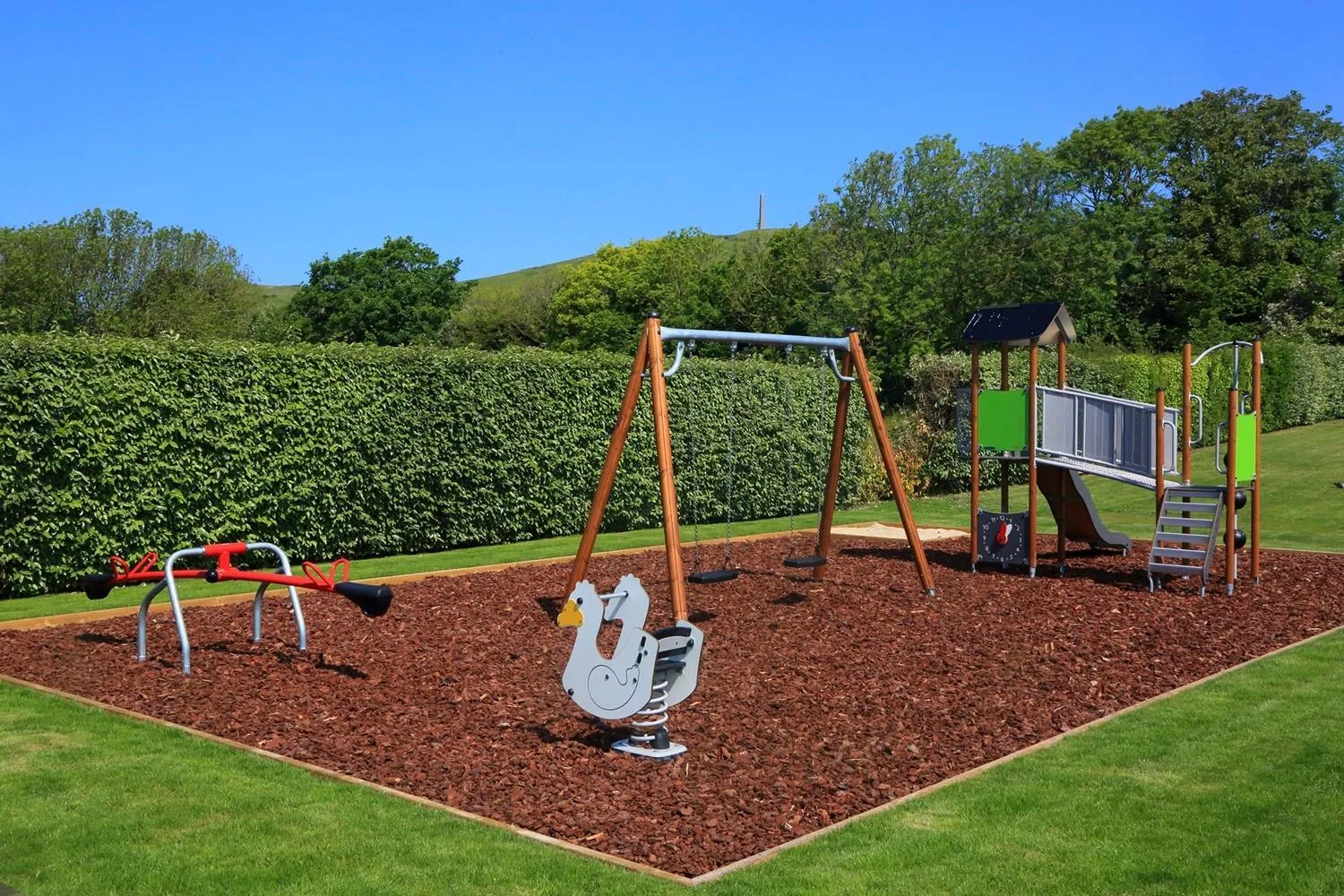 Children play ground in Hôtel L'Escale - Piscine & SPA