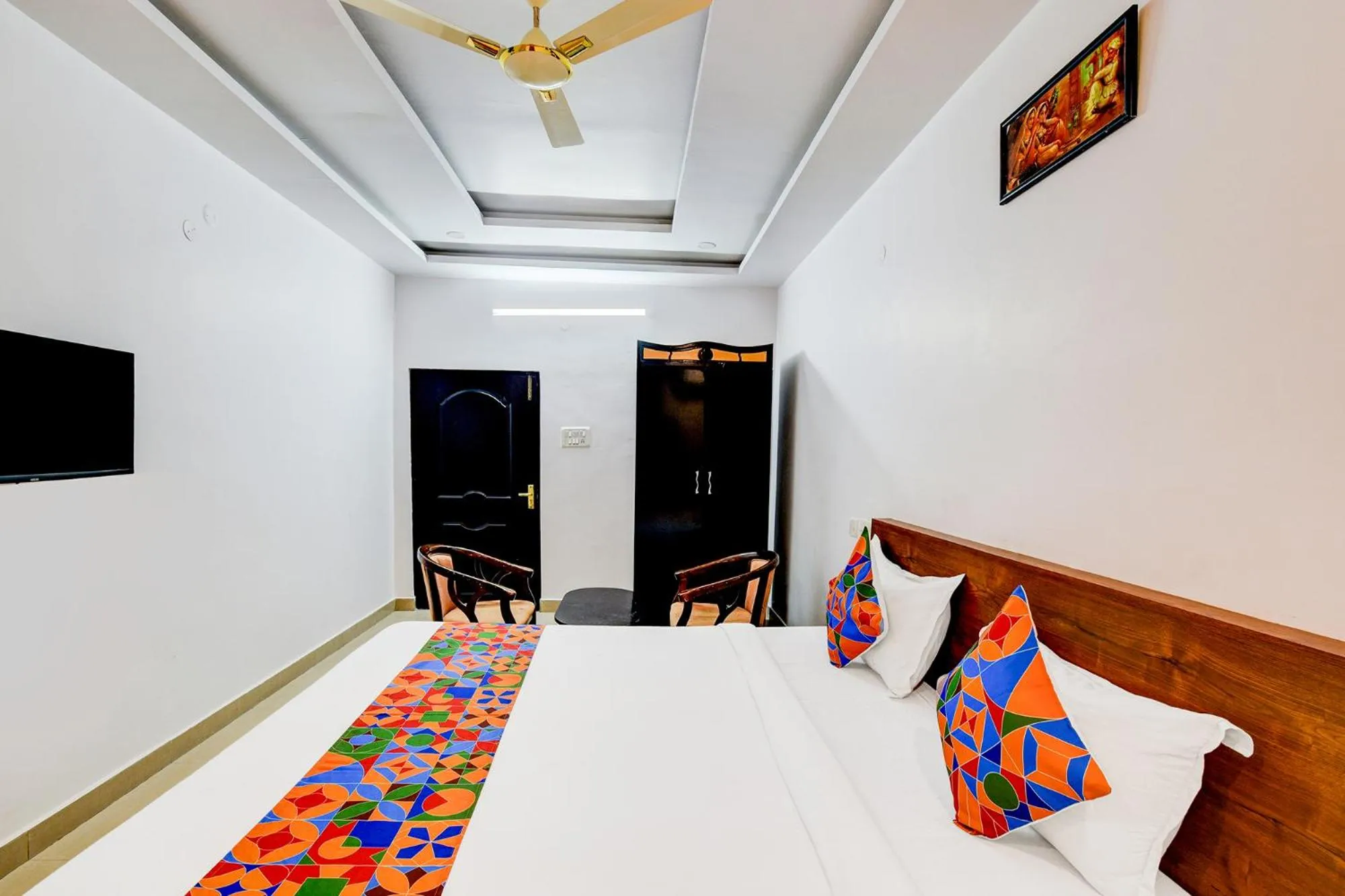 Bed in FabHotel Pushpa Grand