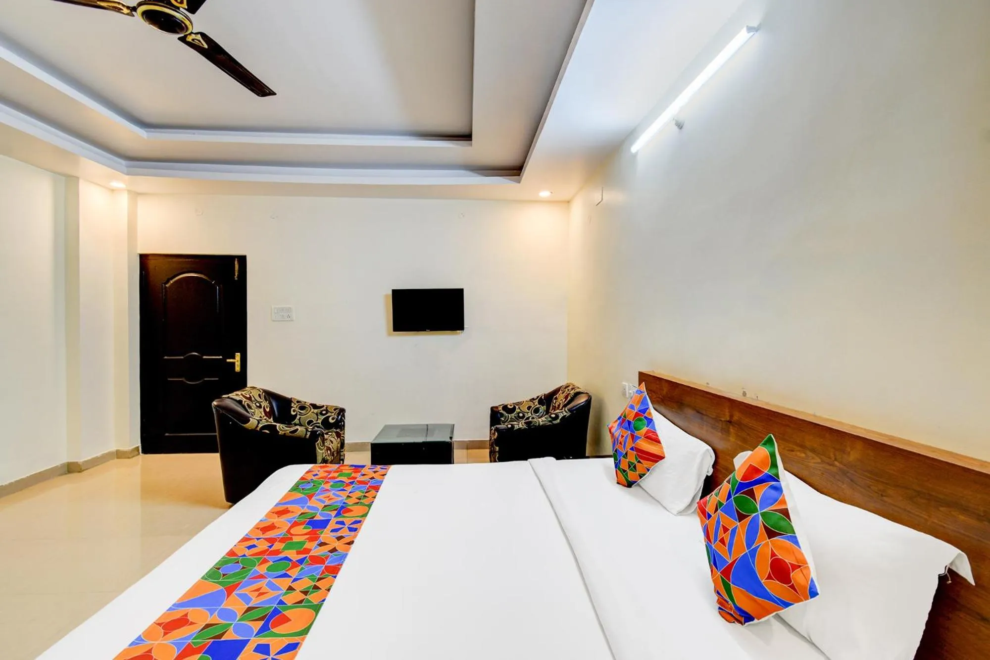 Bed in FabHotel Pushpa Grand