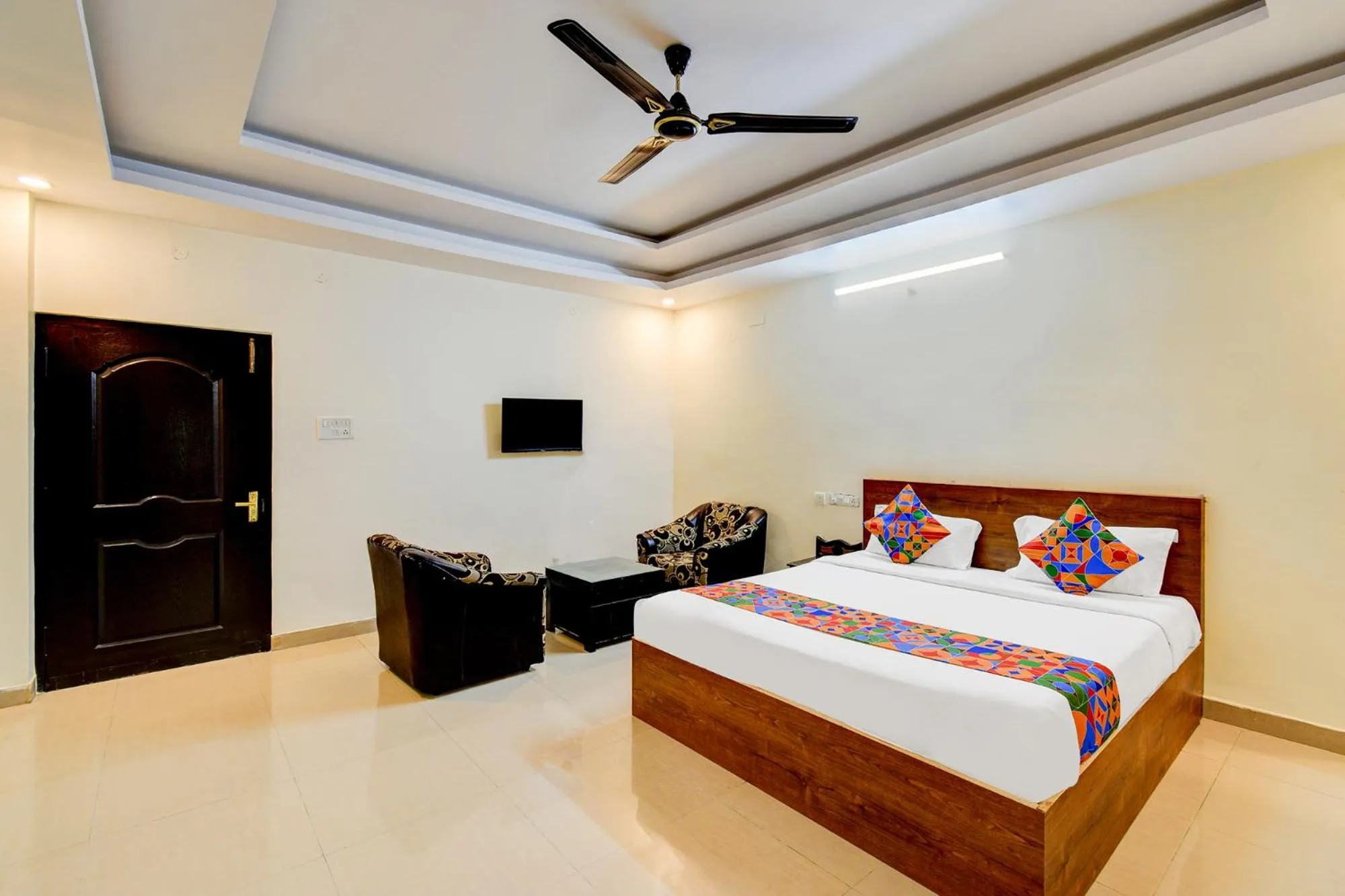 Bed in FabHotel Pushpa Grand