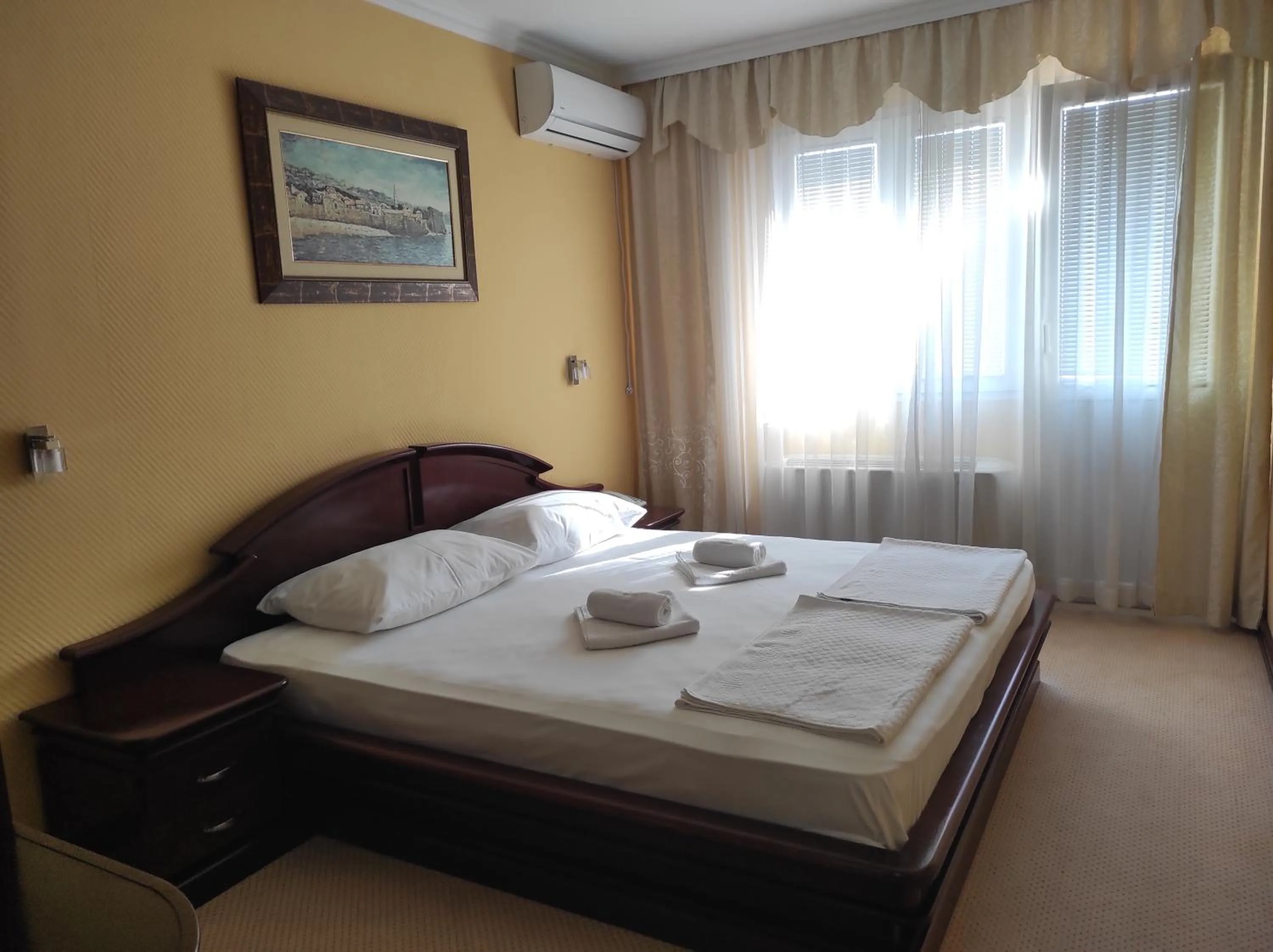 Bed in Hotel Mimoza