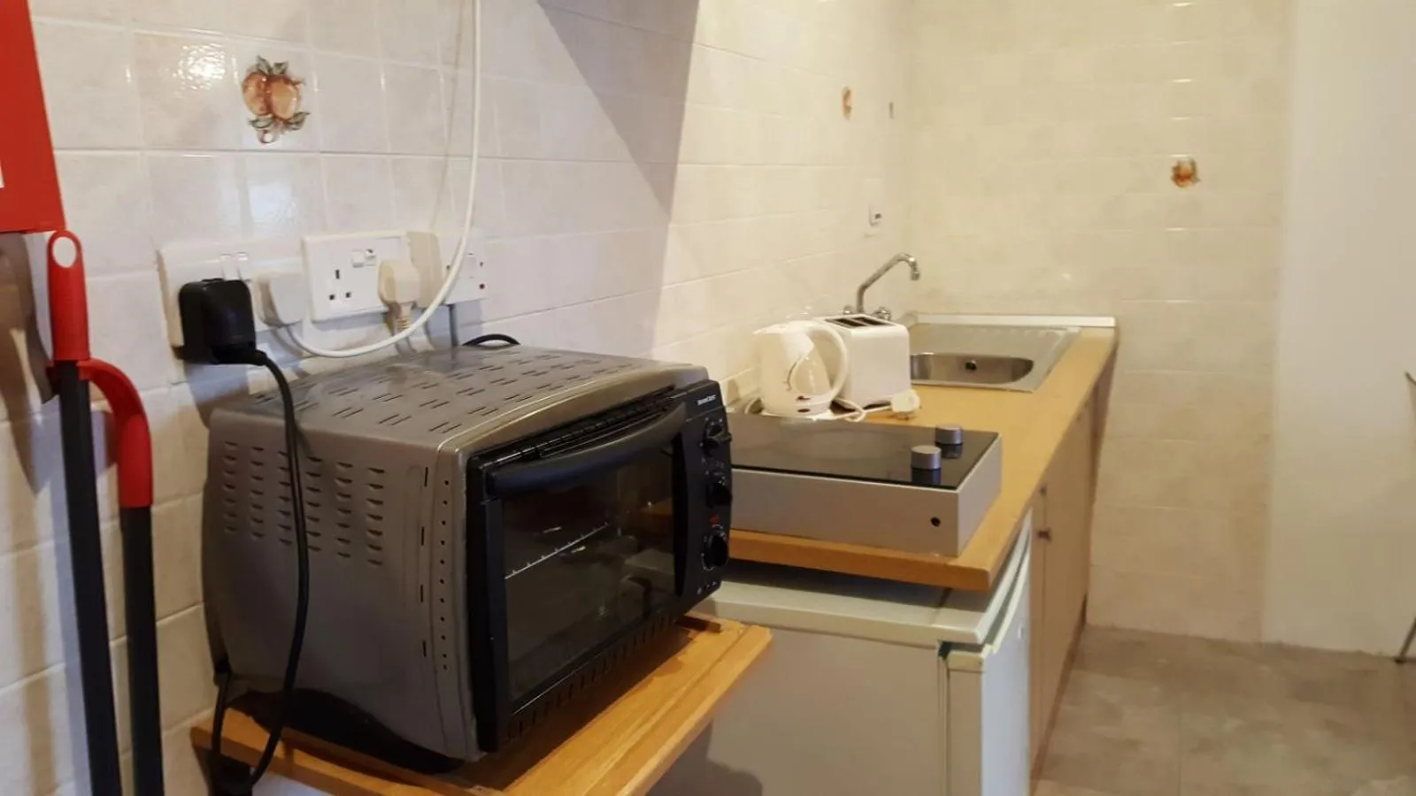 Kitchen or kitchenette in Alborada Apart Hotel