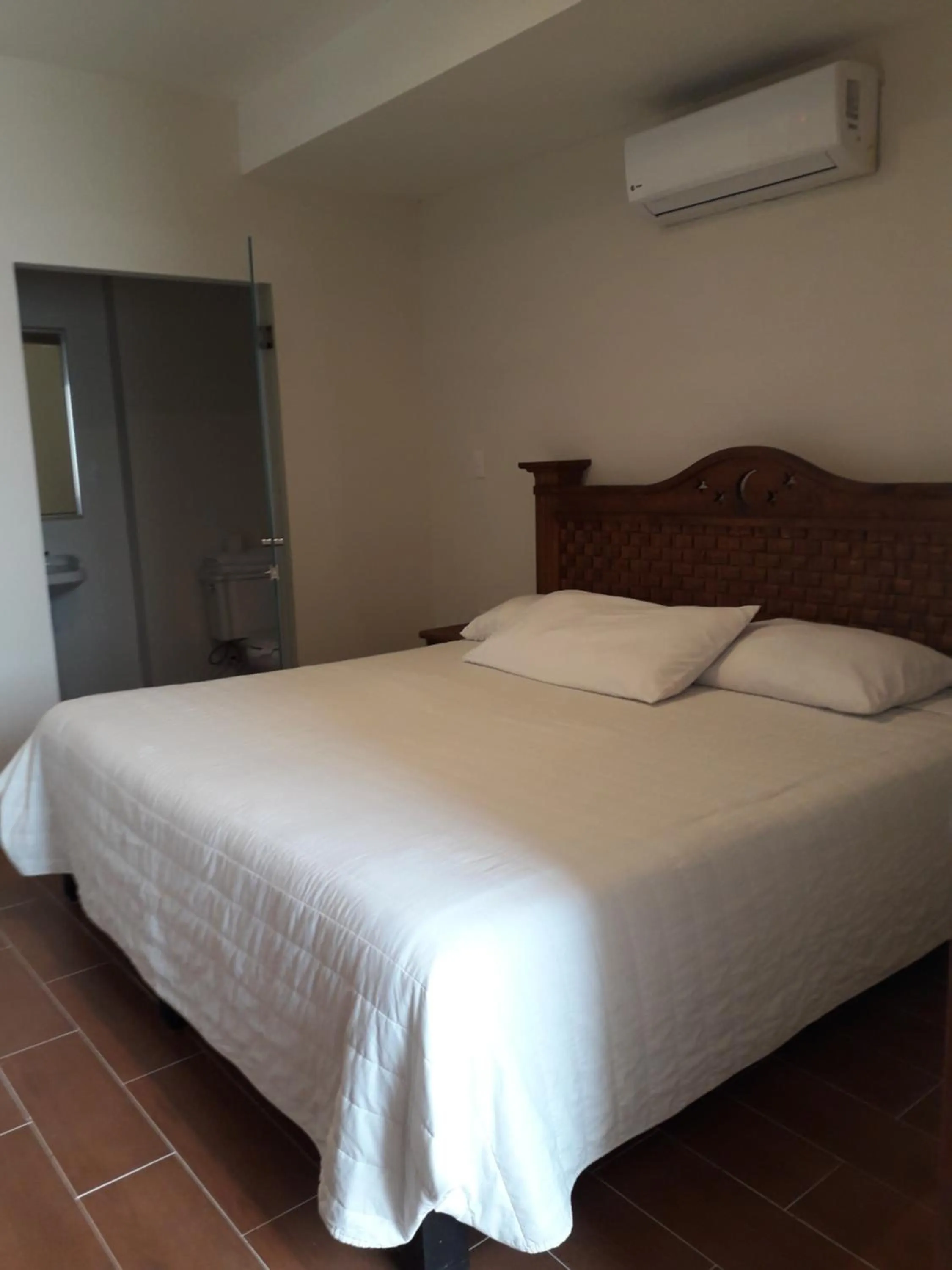 Bed in Hotel Purisima Concepción