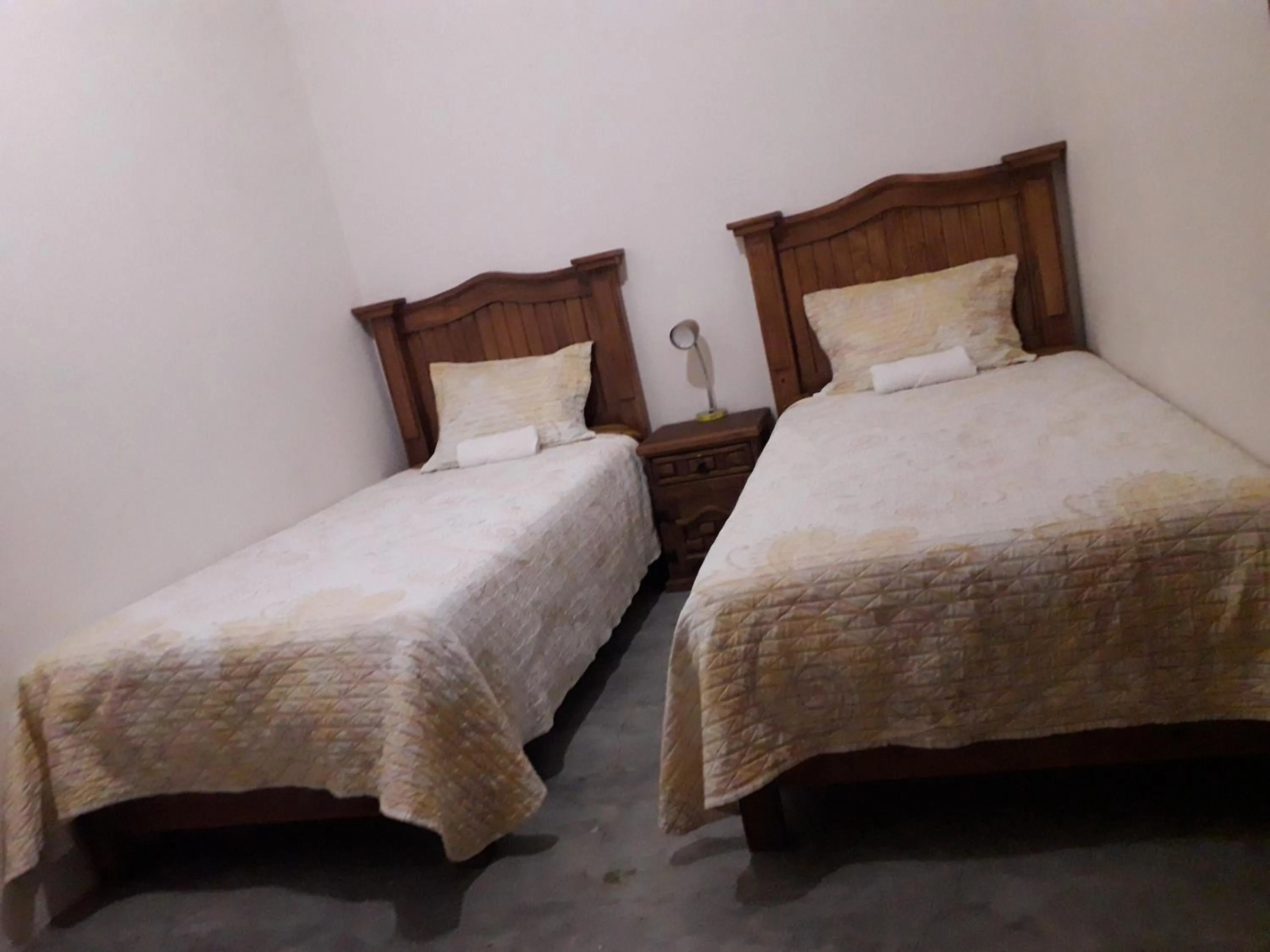 Bed in Hotel Purisima Concepción