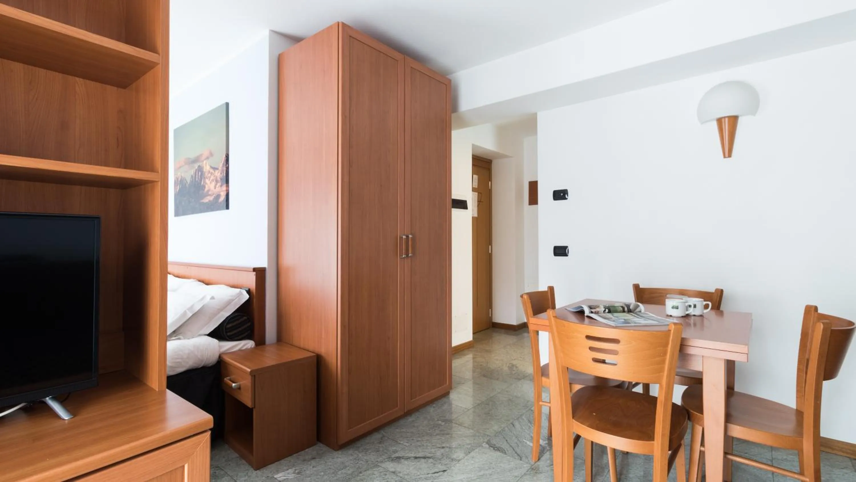 Living room, Bed in Residence Pizzo Scalino