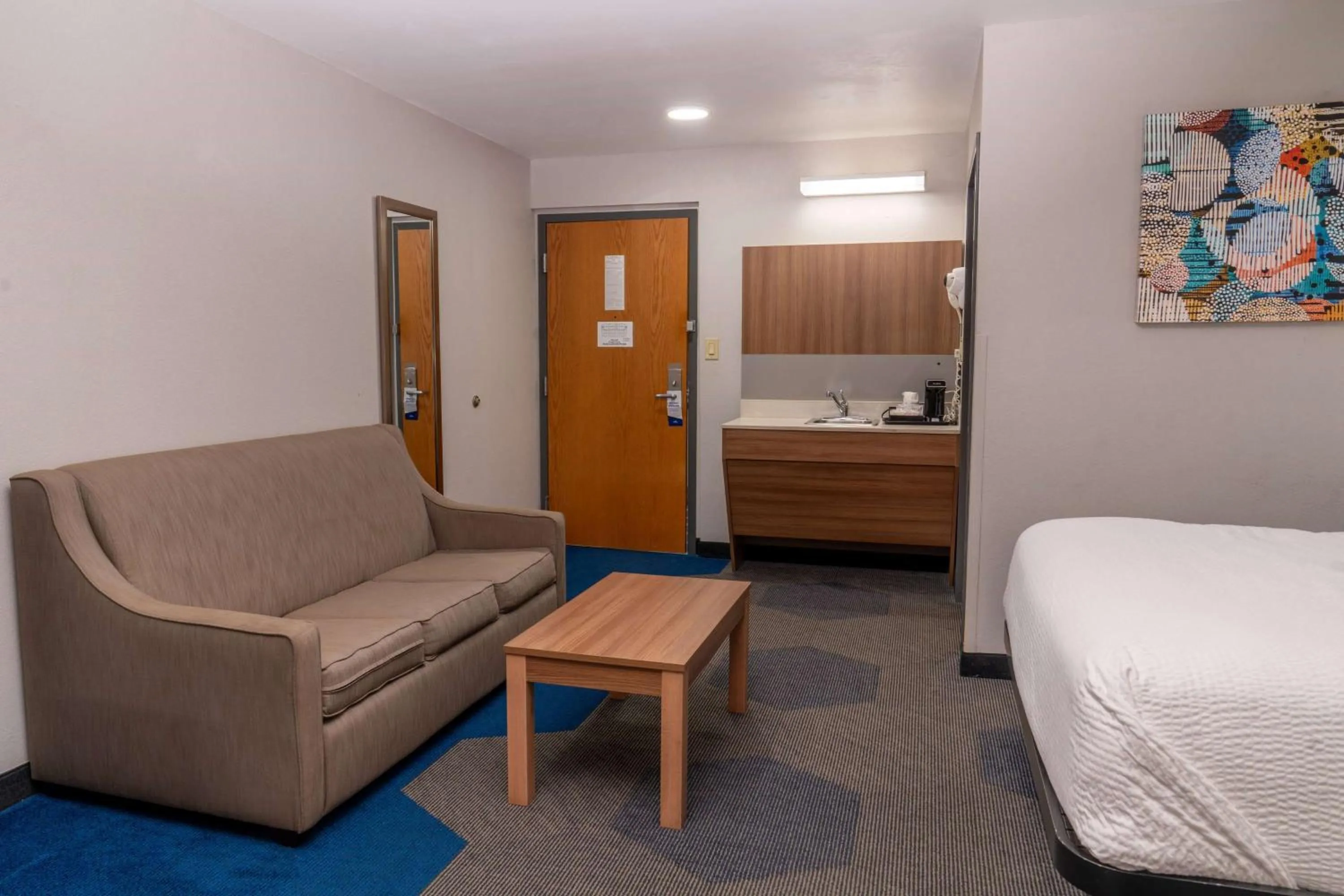 Bed in Microtel Inn & Suites by Wyndham Pigeon Forge