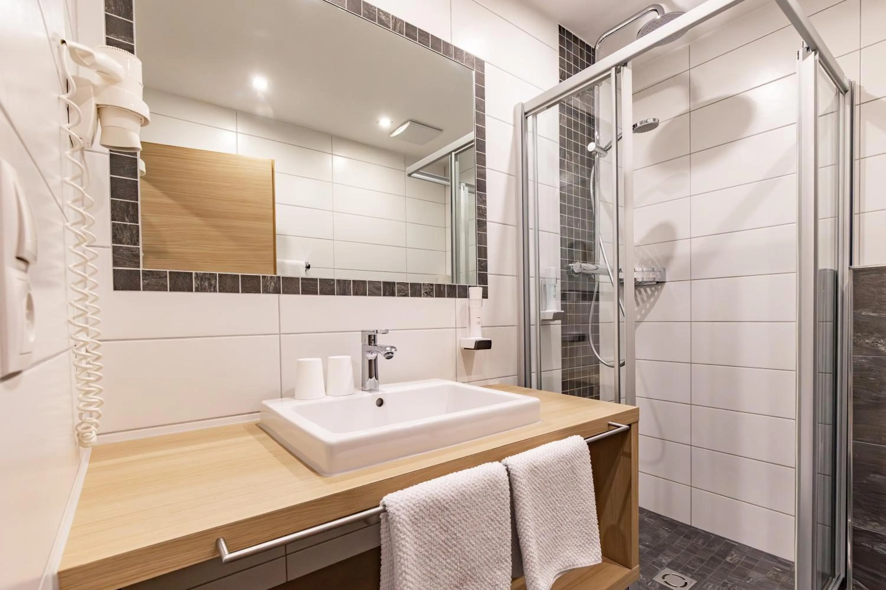 Shower in Das Aparthotel Olympia Tirol