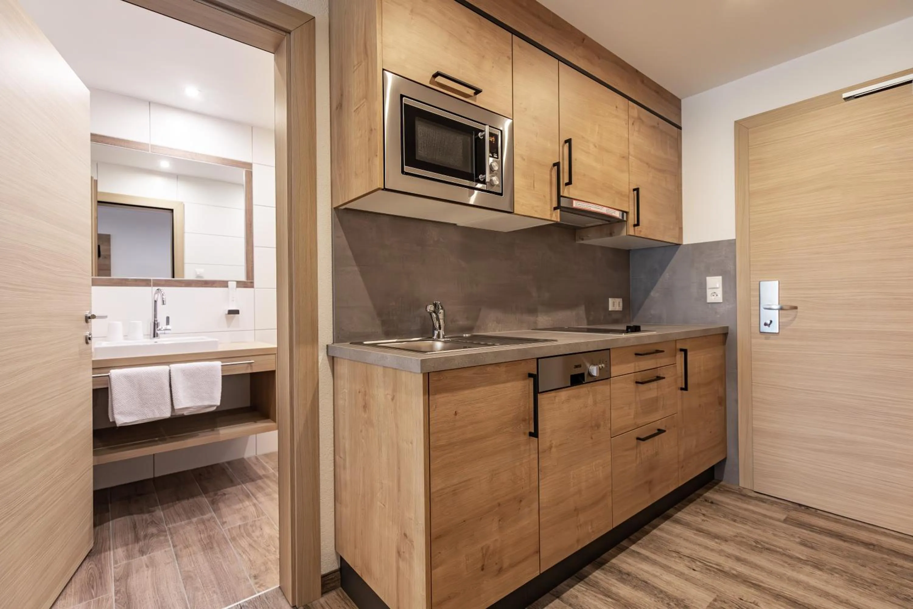 Kitchen or kitchenette in Das Aparthotel Olympia Tirol