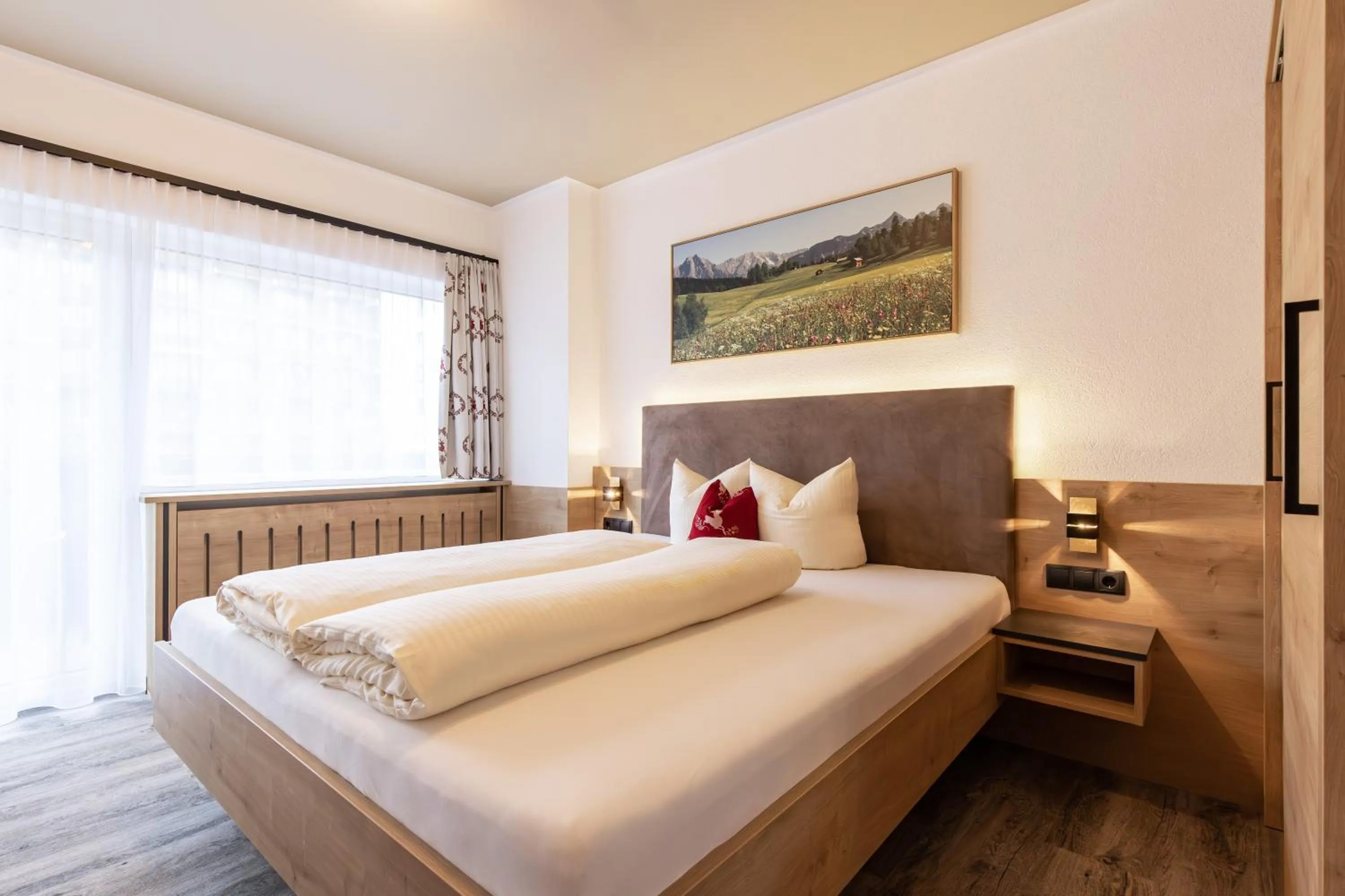 Bed in Das Aparthotel Olympia Tirol