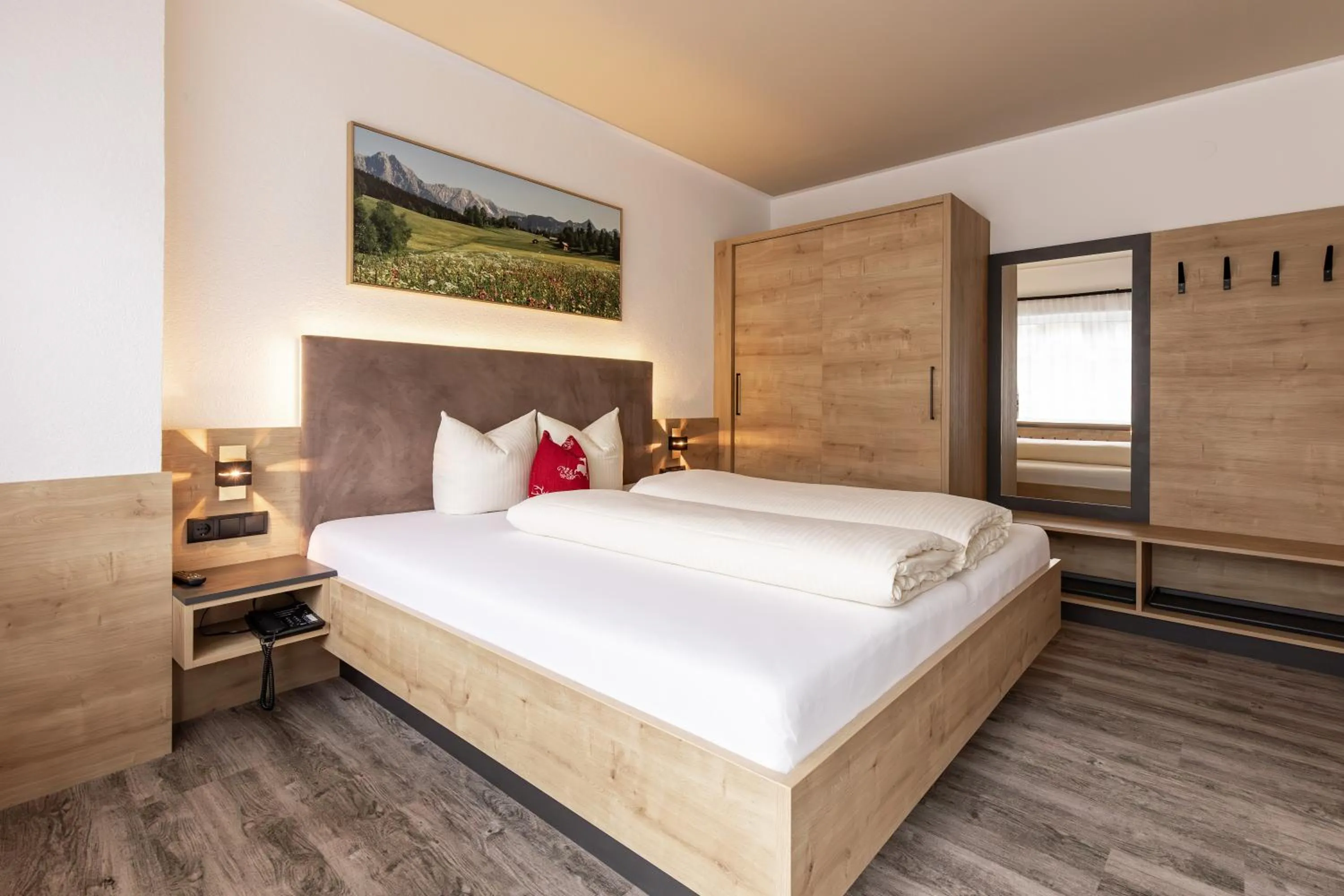 Bed in Das Aparthotel Olympia Tirol