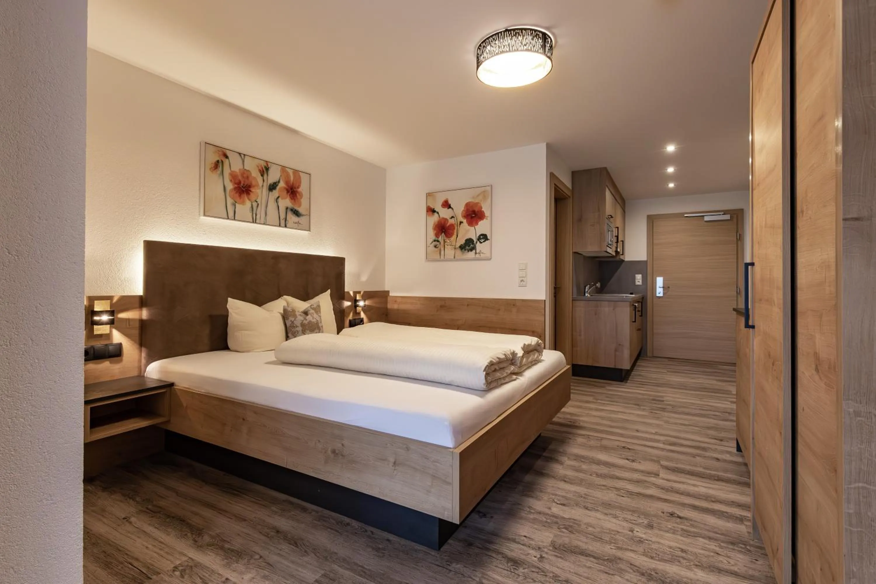 Bed in Das Aparthotel Olympia Tirol