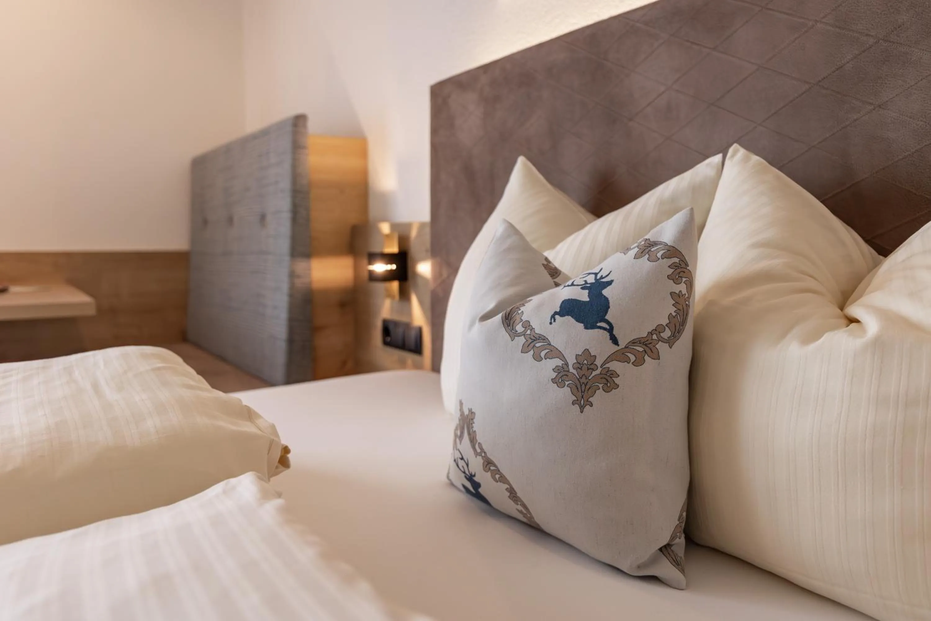 Bed in Das Aparthotel Olympia Tirol