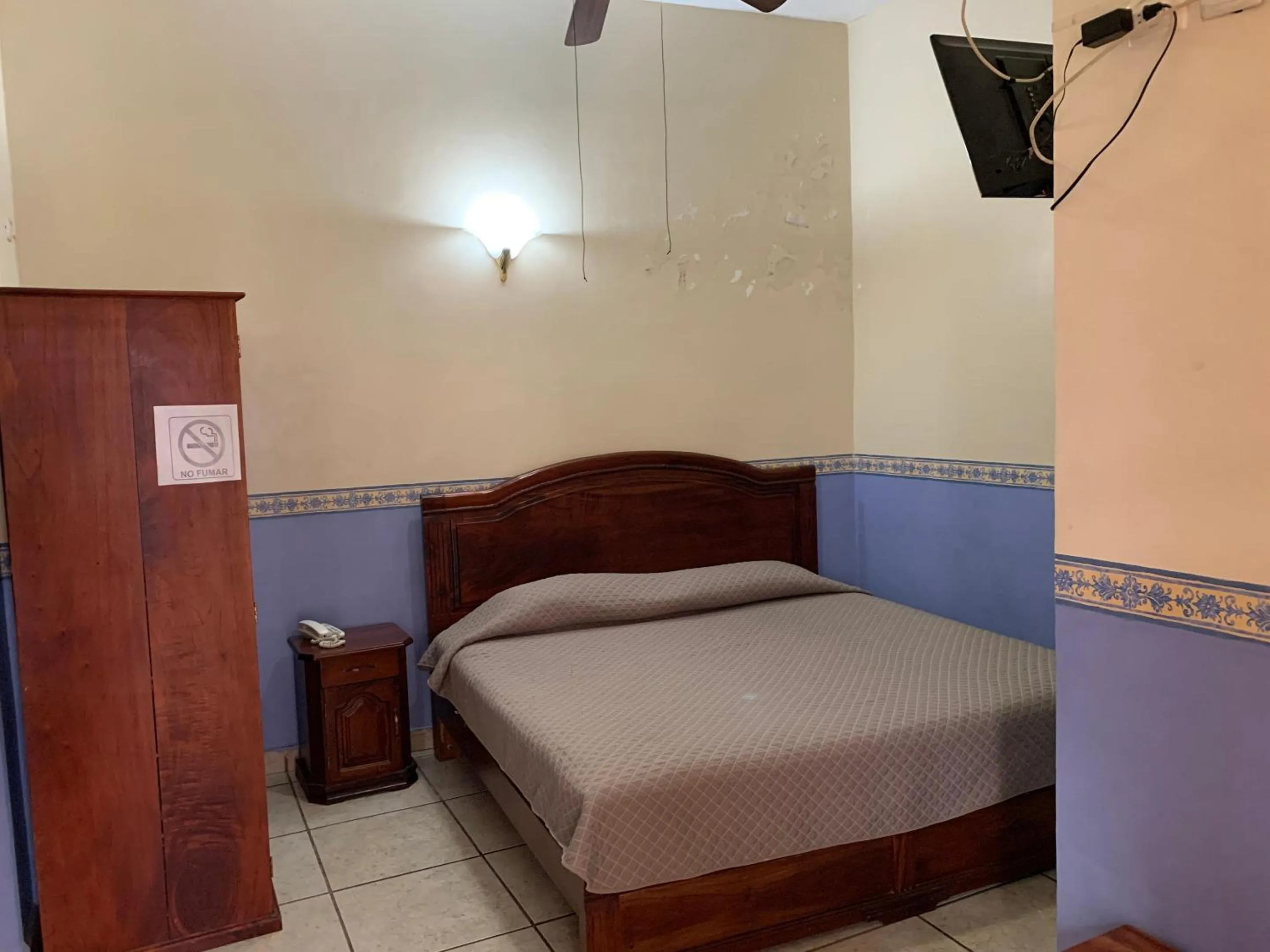 Bedroom in OYO Hotel Real de Cortés