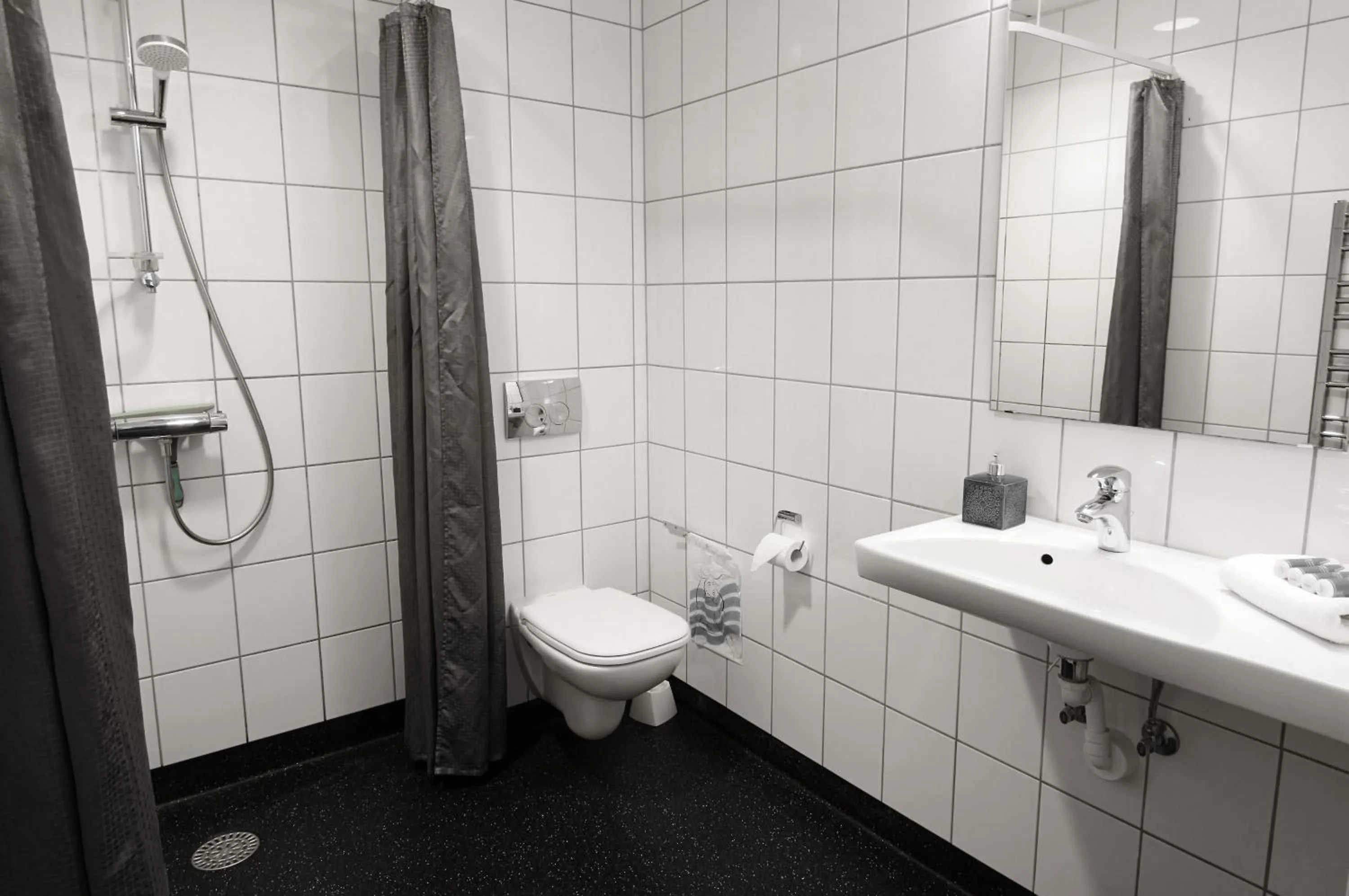 Shower in ApartHotel Faber