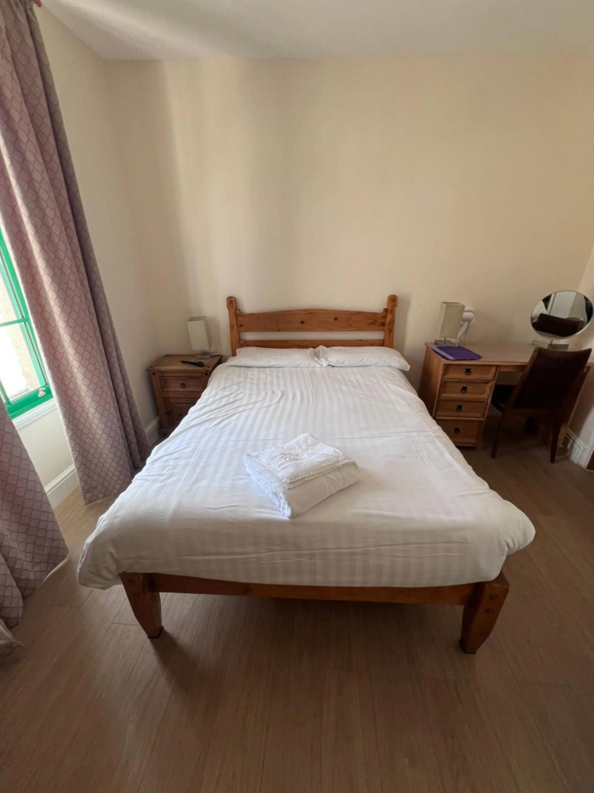 Bed in Royal Britannia Hotel