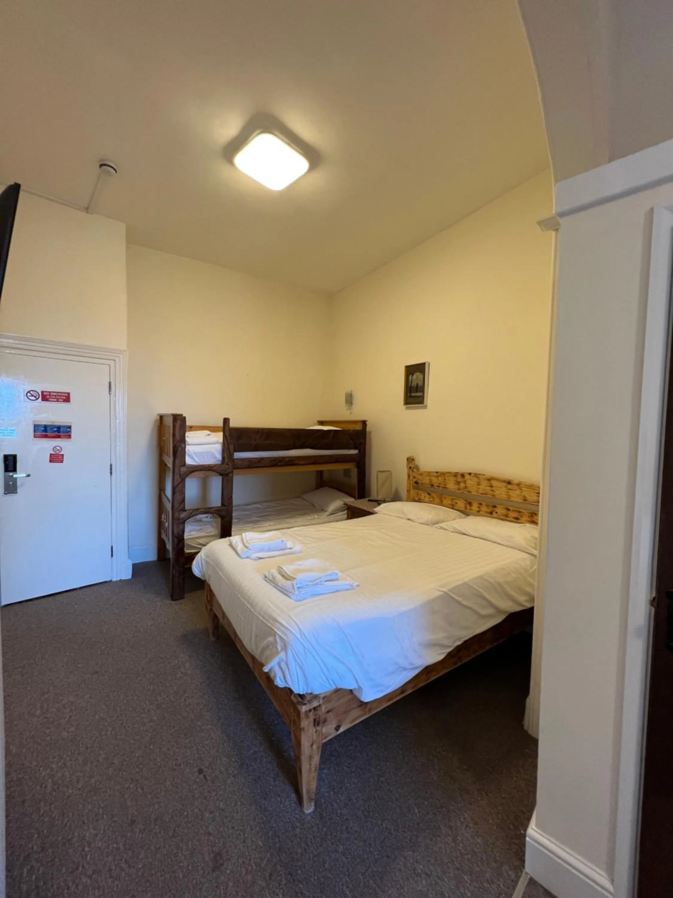 Bed in Royal Britannia Hotel