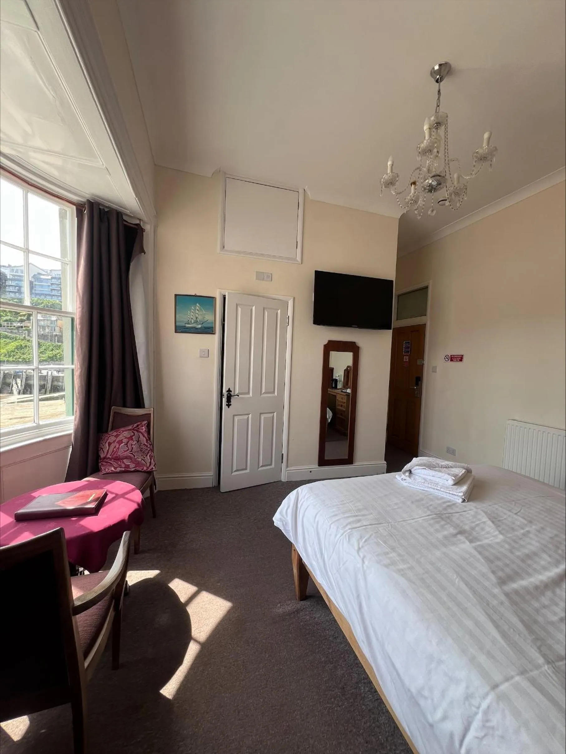 Bed in Royal Britannia Hotel