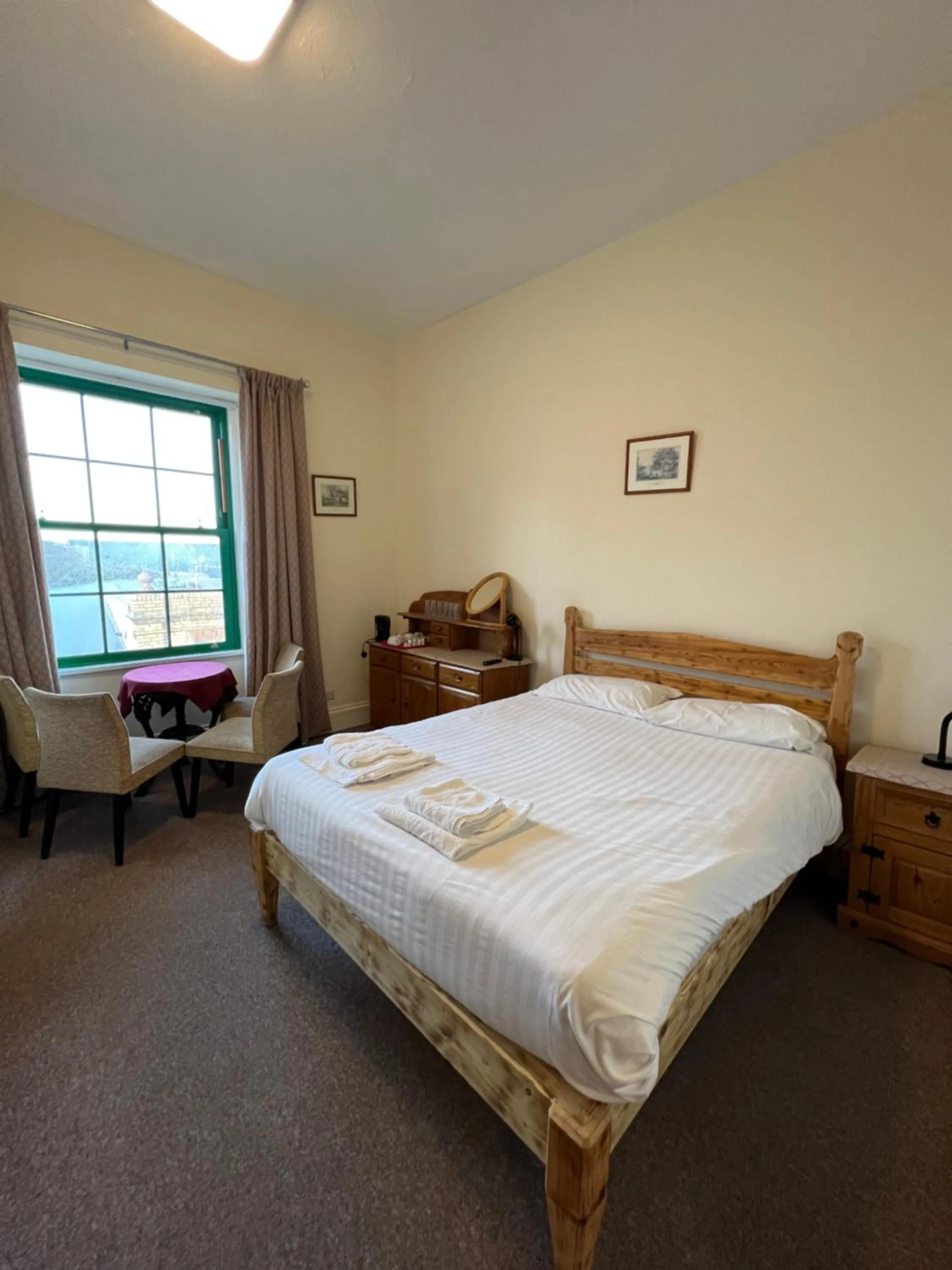 Bed in Royal Britannia Hotel