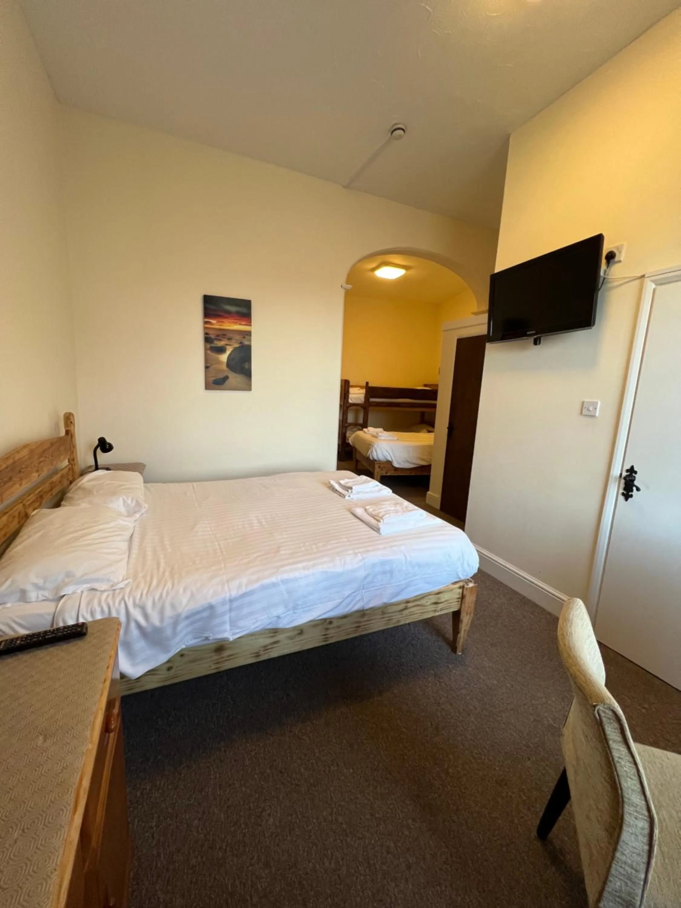 Bed in Royal Britannia Hotel