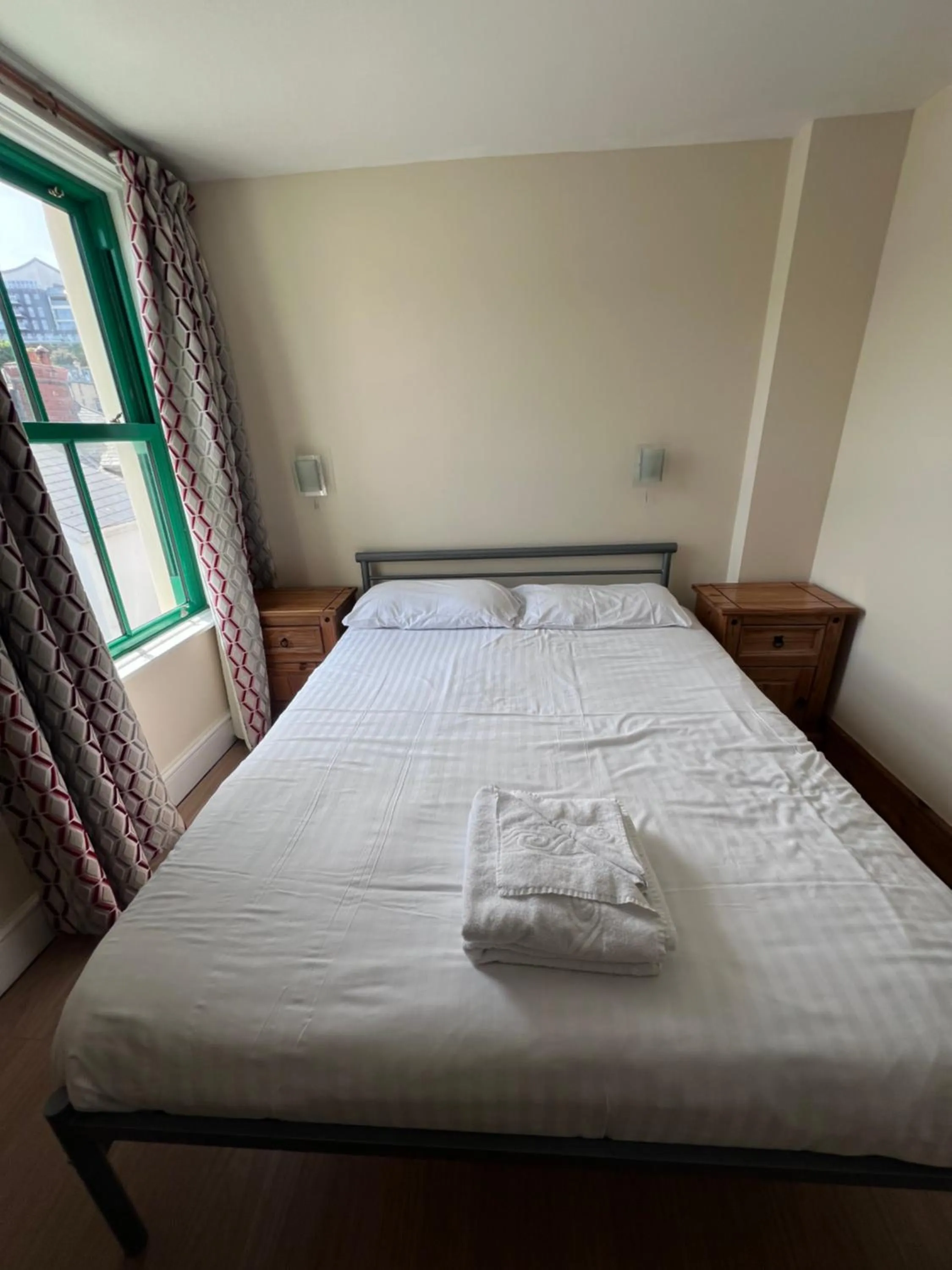 Bed in Royal Britannia Hotel