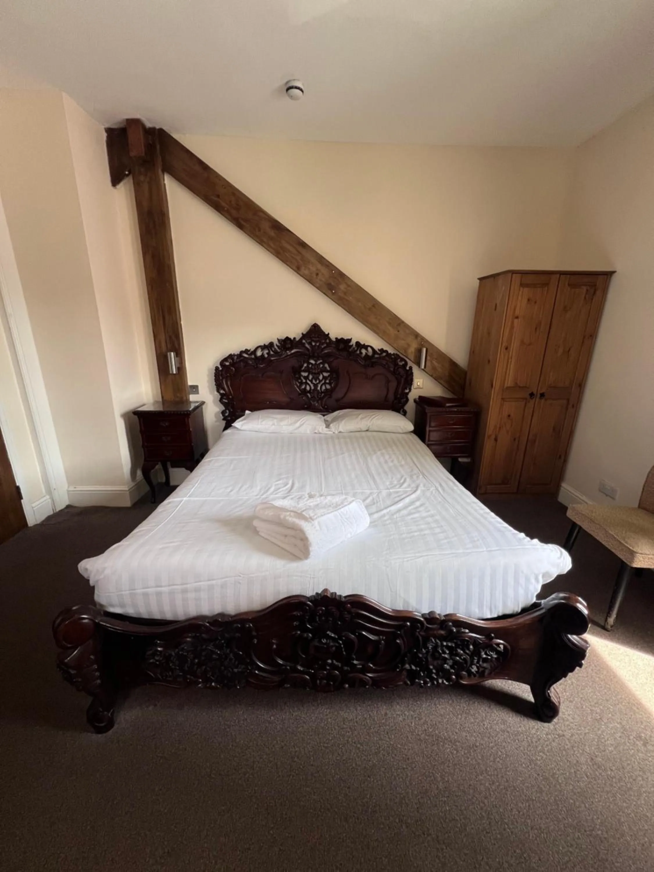 Bed in Royal Britannia Hotel