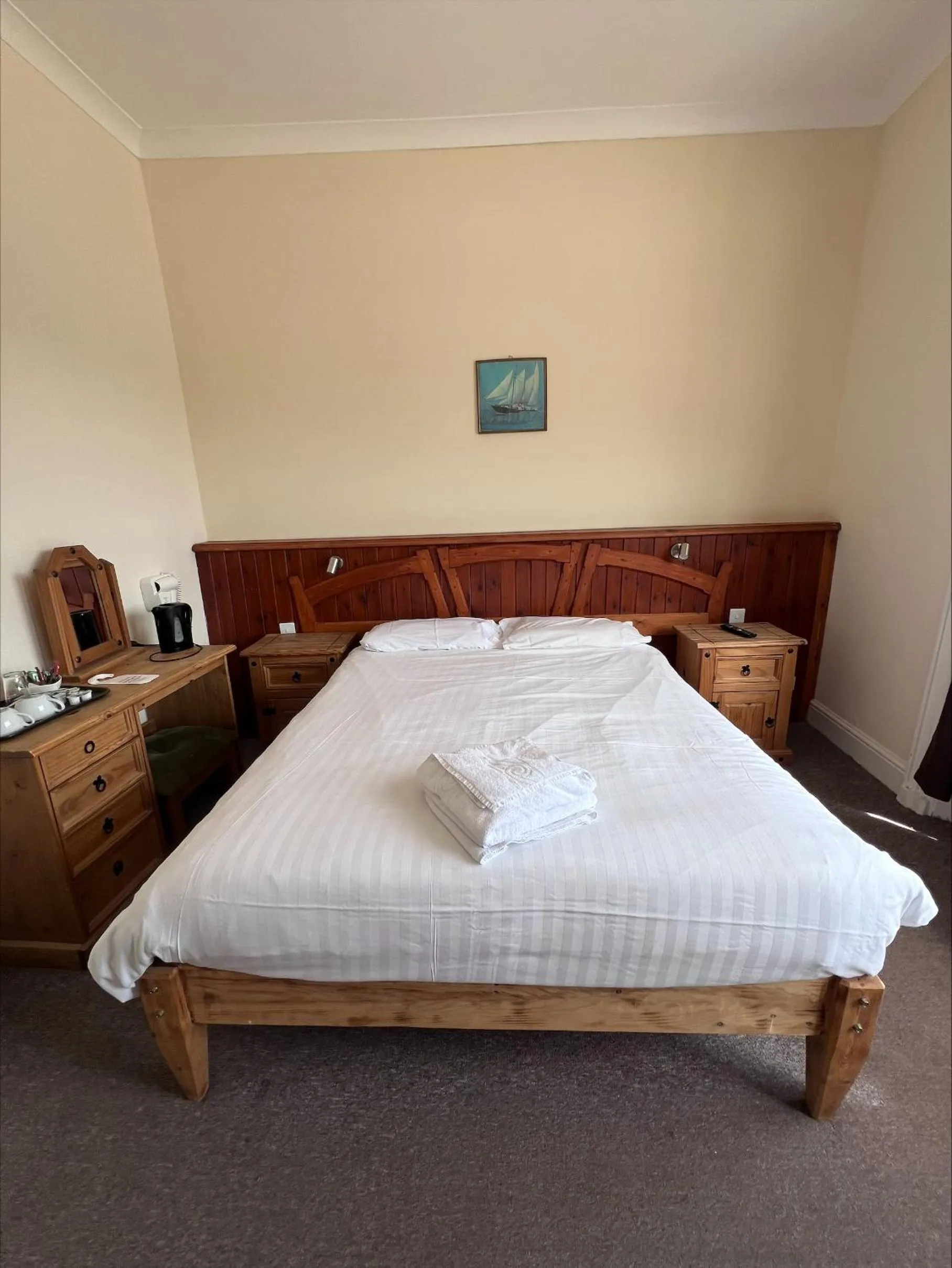 Bed in Royal Britannia Hotel