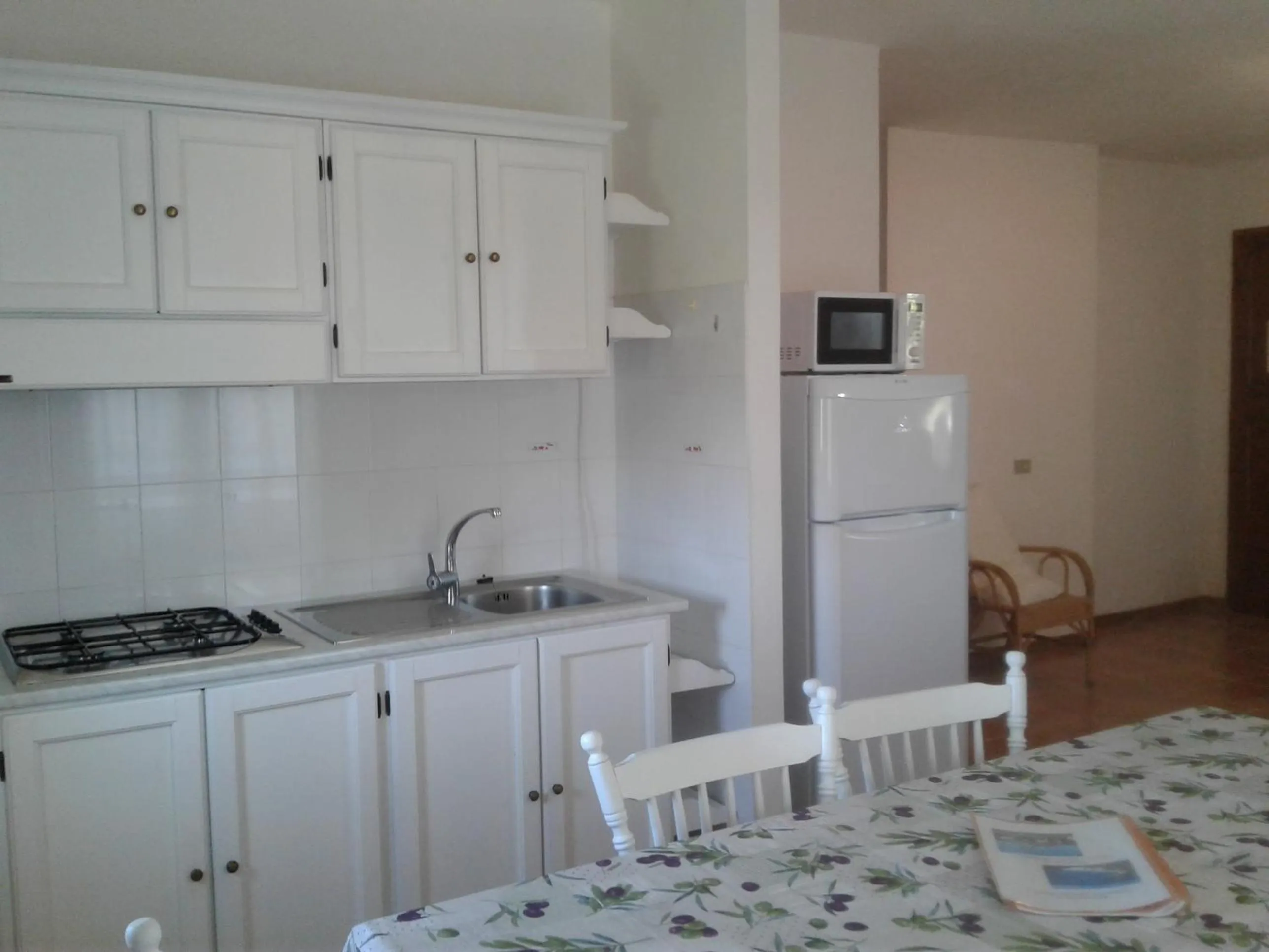 Kitchen or kitchenette in Residence Spiaggia Bianca