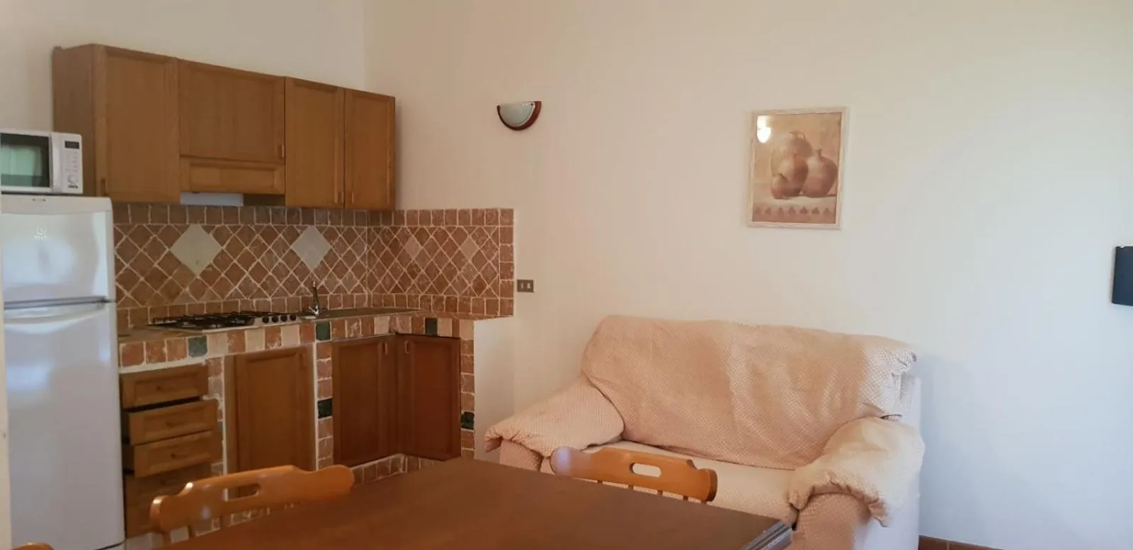 Kitchen or kitchenette in Residence Spiaggia Bianca