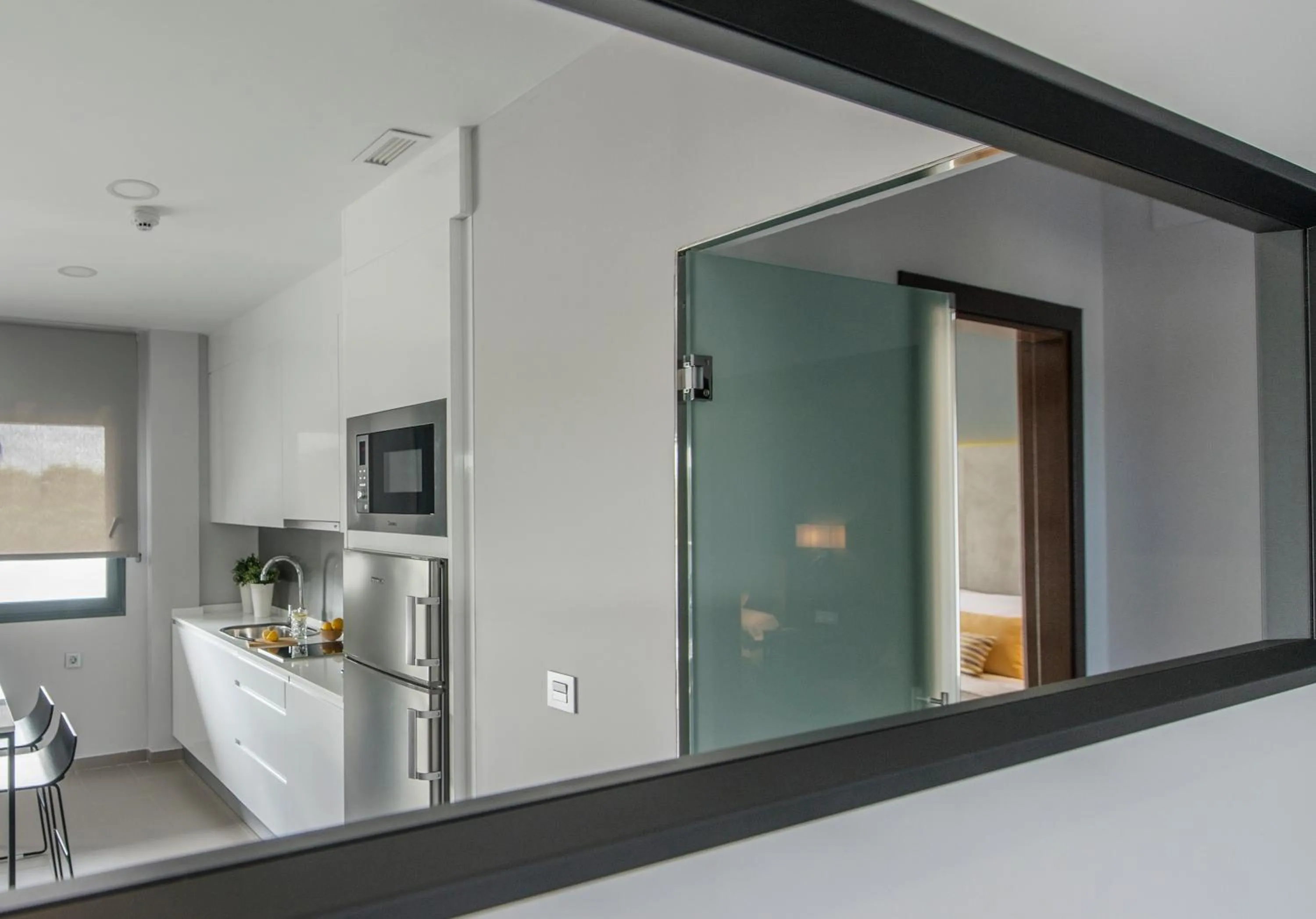 Kitchen or kitchenette in Sevilla Green Suites