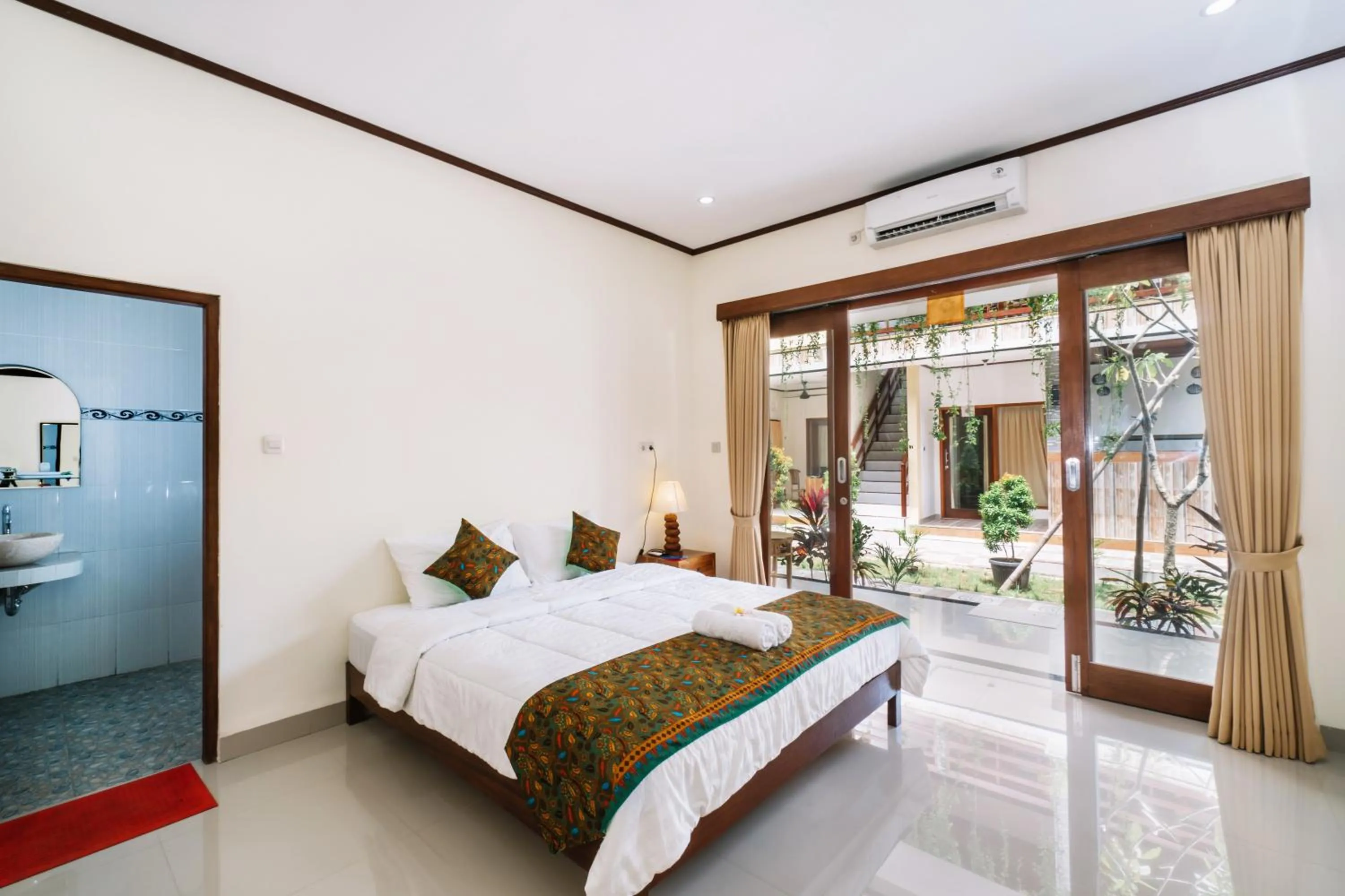 Bed in Sari Nusa Inn