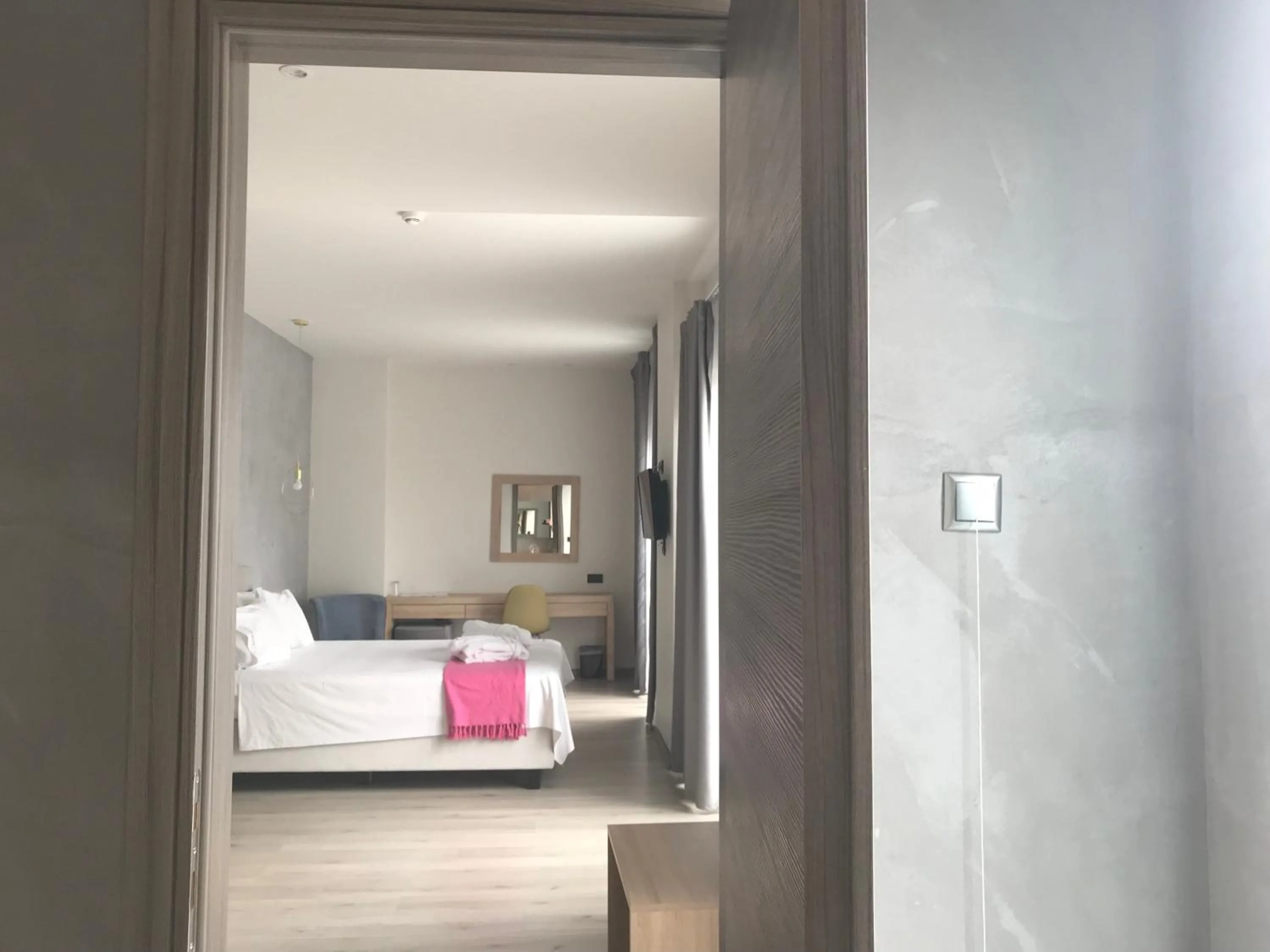 Bed in Superior One Boutique Hotel