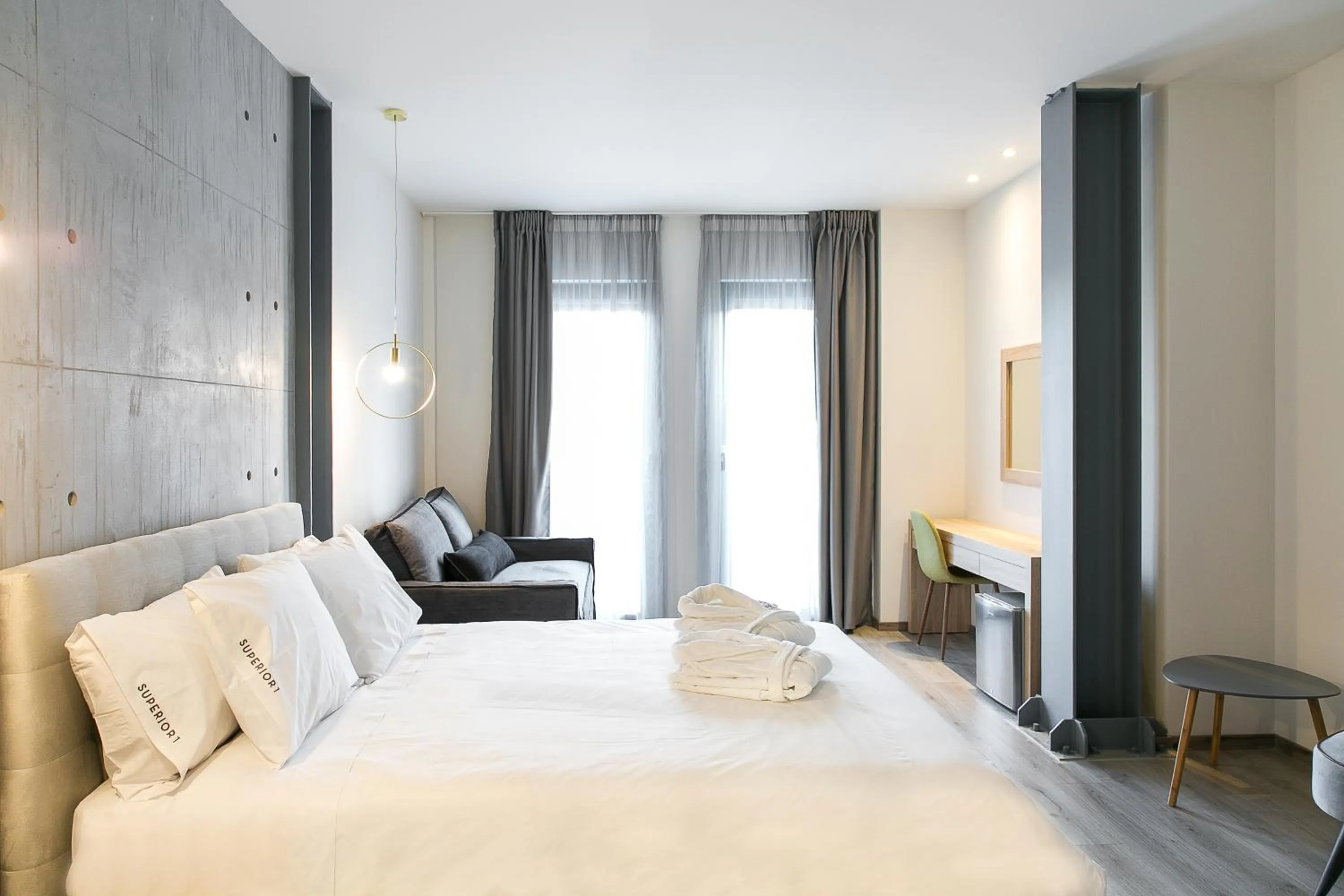 Bed in Superior One Boutique Hotel