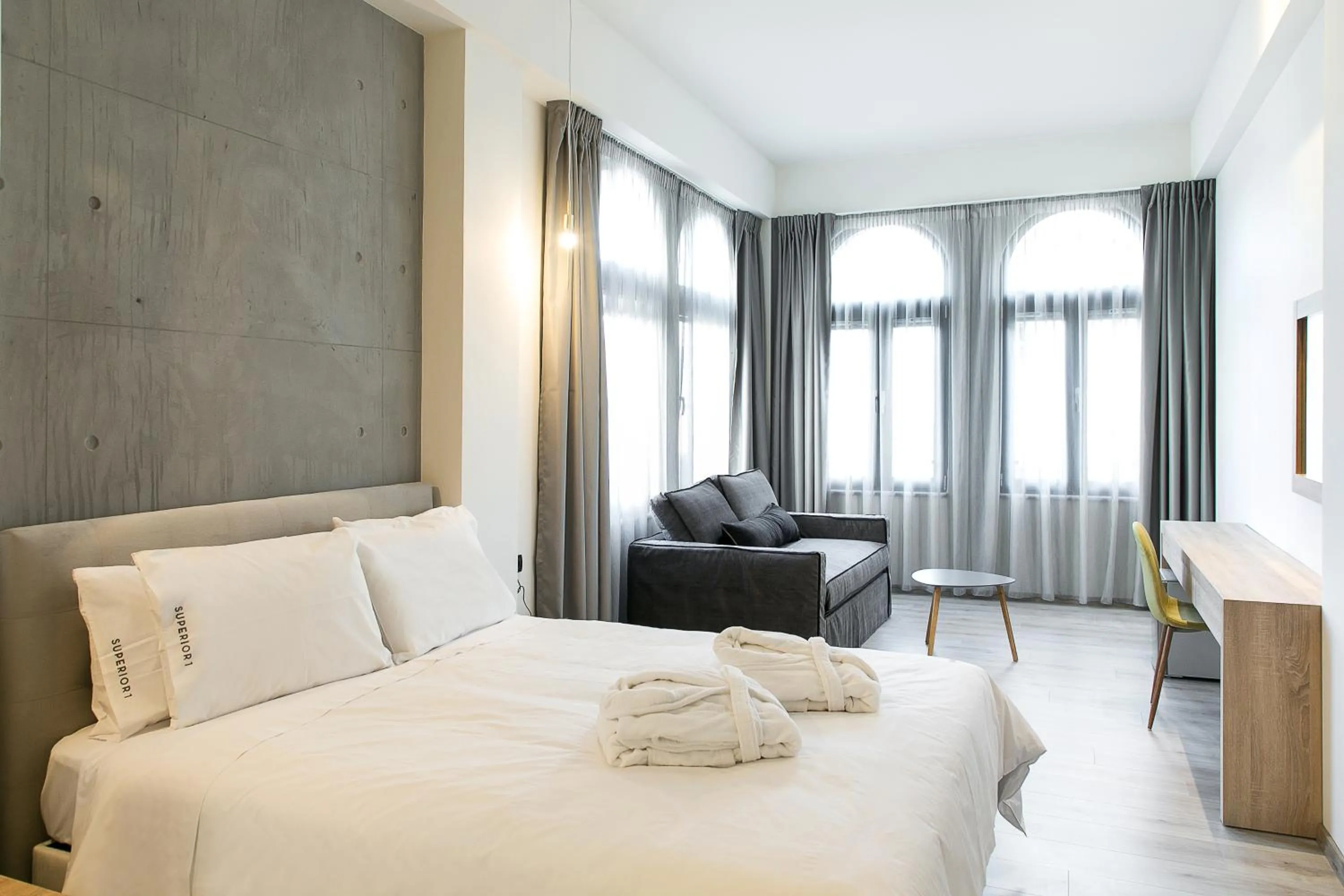 Bed in Superior One Boutique Hotel