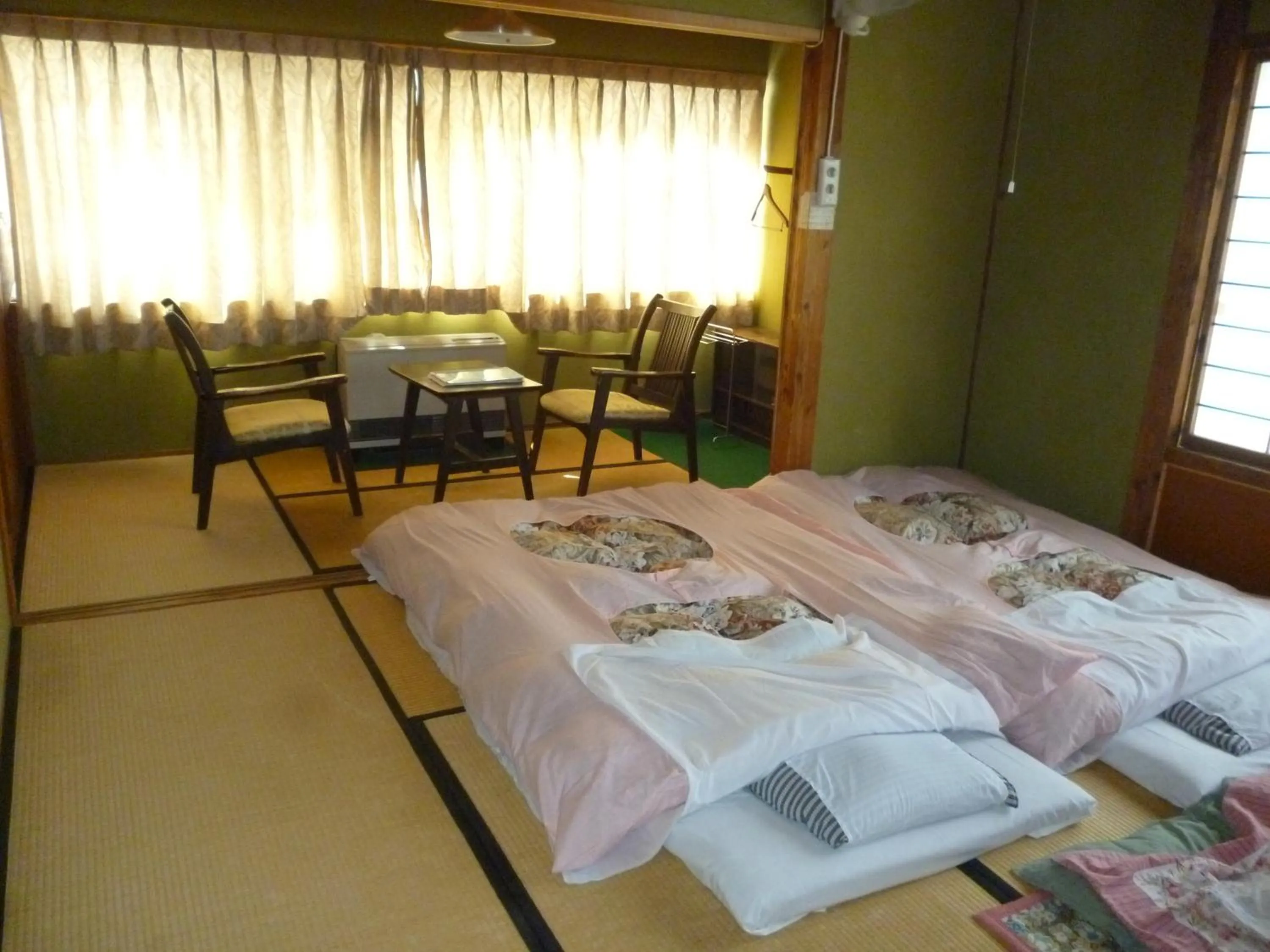 Photo of the whole room, Bed in Uotoshi Ryokan