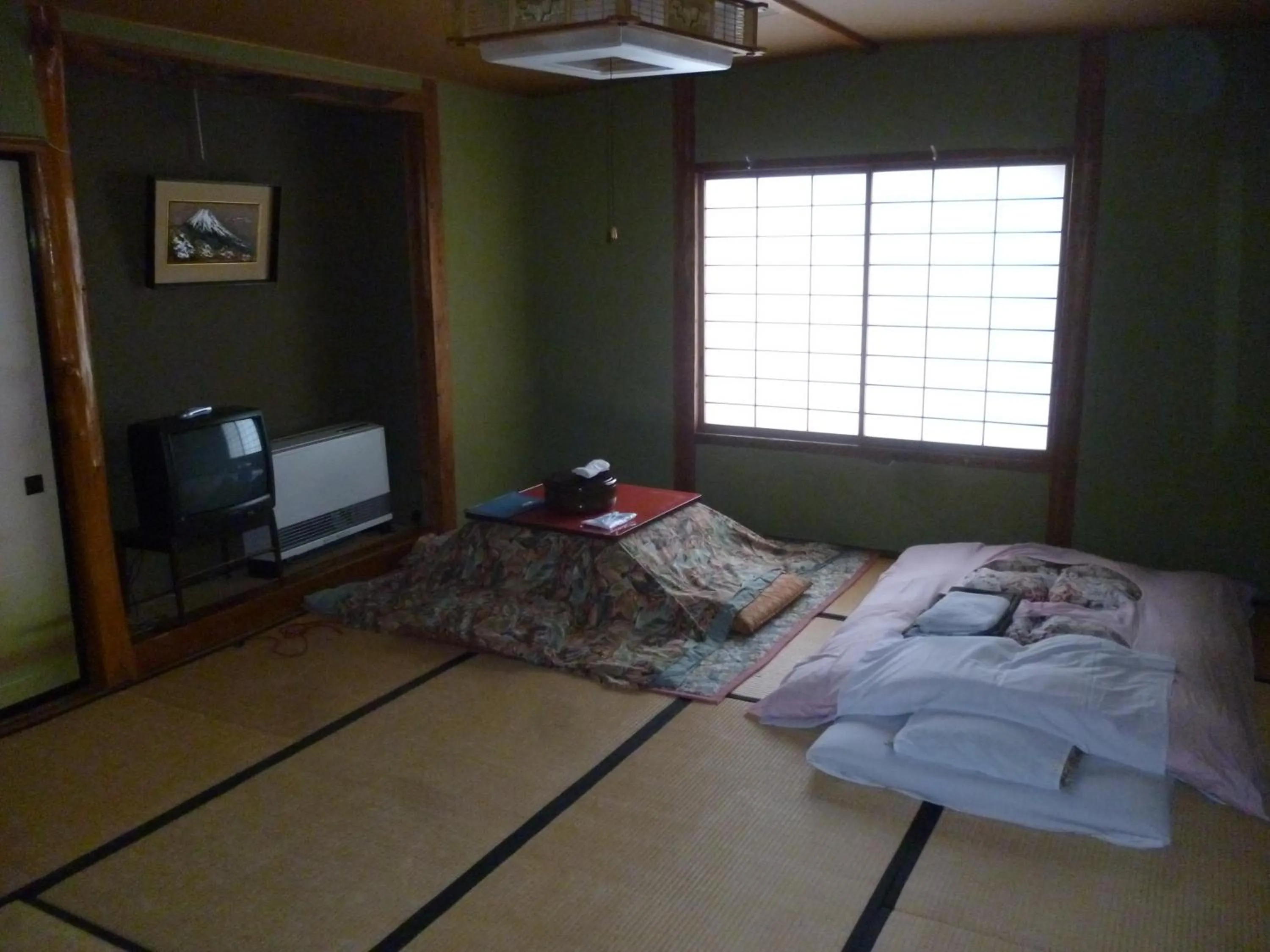 Photo of the whole room, Bed in Uotoshi Ryokan