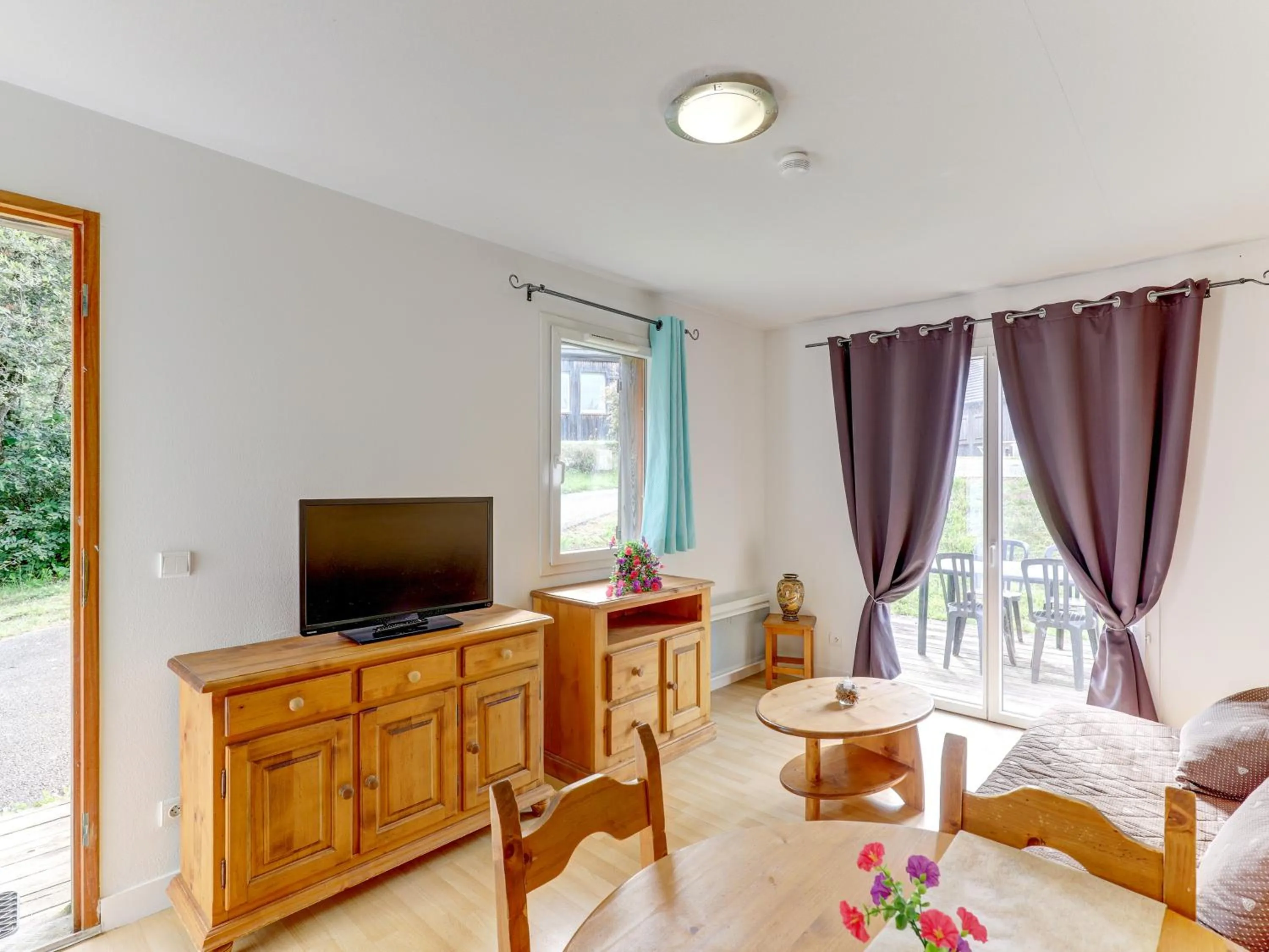 Living room in Vacancéole - Residence le Domaine du Bosquet