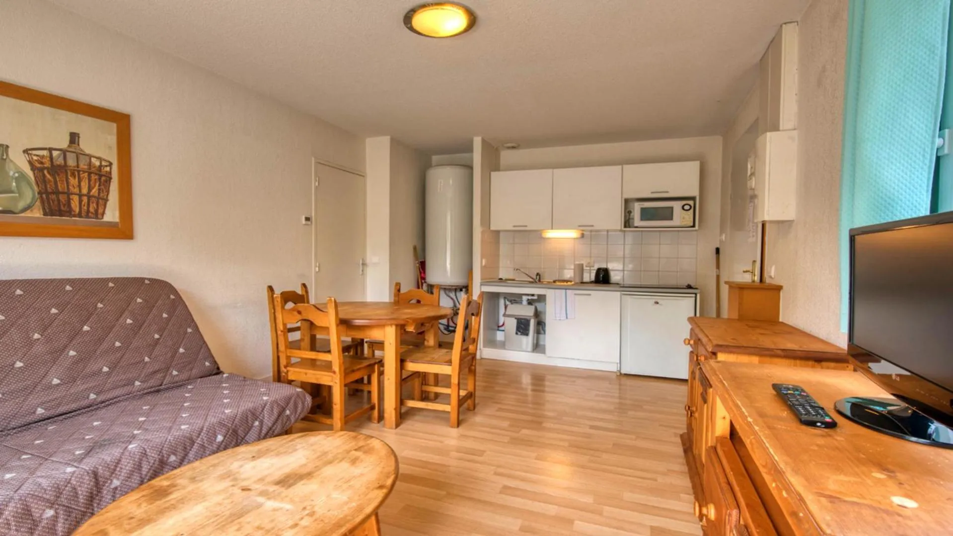 Kitchen or kitchenette in Vacancéole - Residence le Domaine du Bosquet
