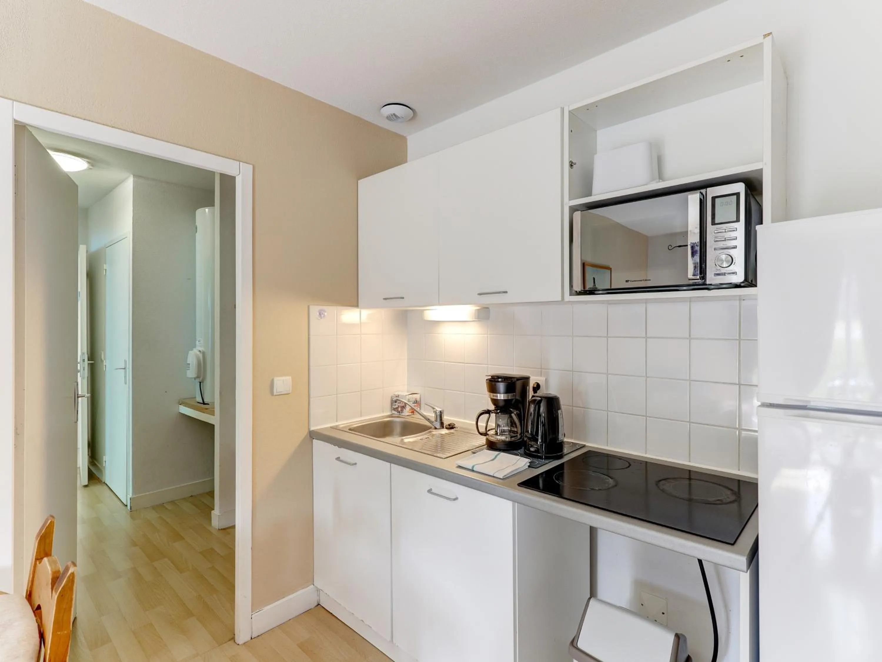 kitchen in Vacancéole - Residence le Domaine du Bosquet