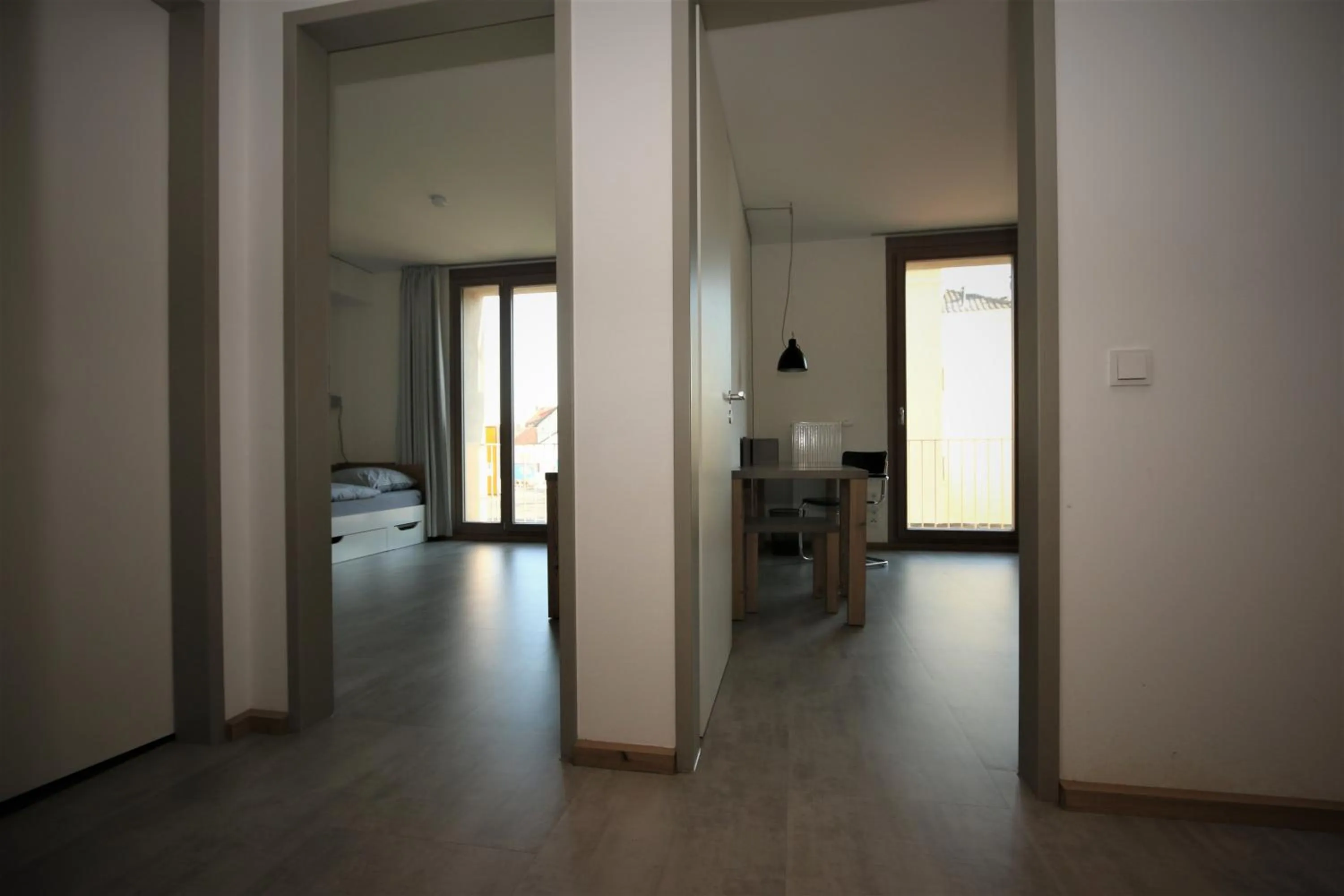 Seating area, Bed in Campus Apartments