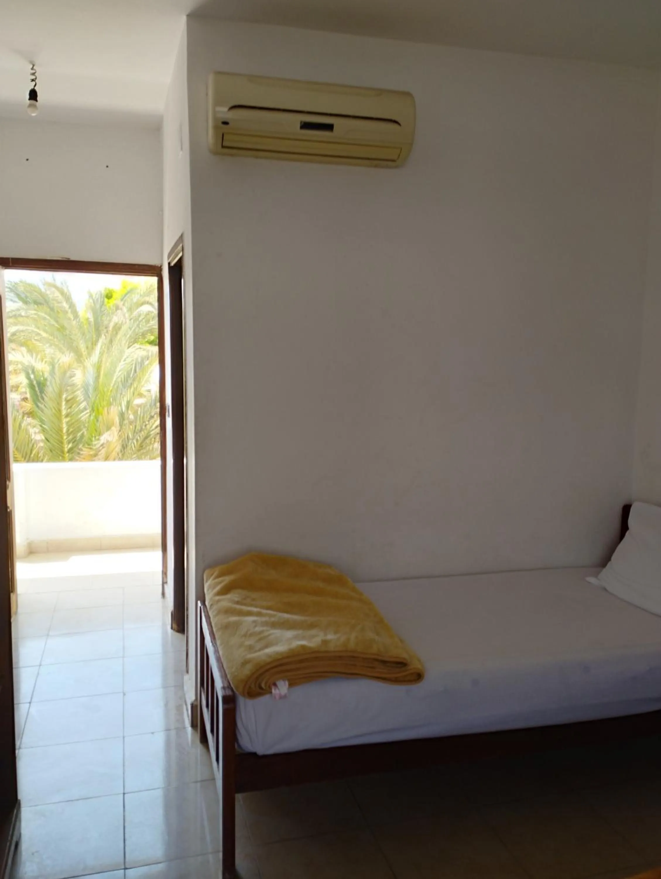 Bed in Jowhara Hotel