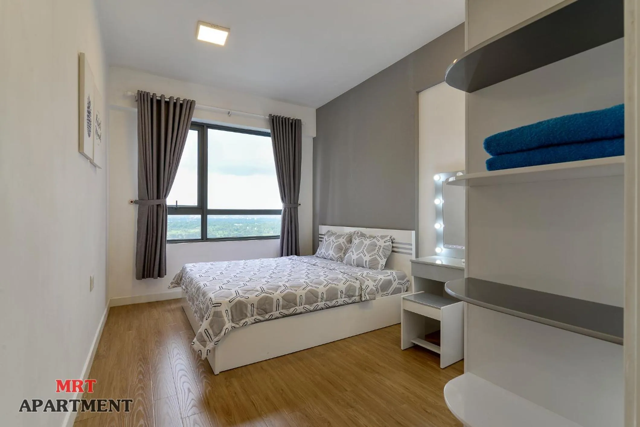 Bed in MRT Apartment In Masteri Thao Dien