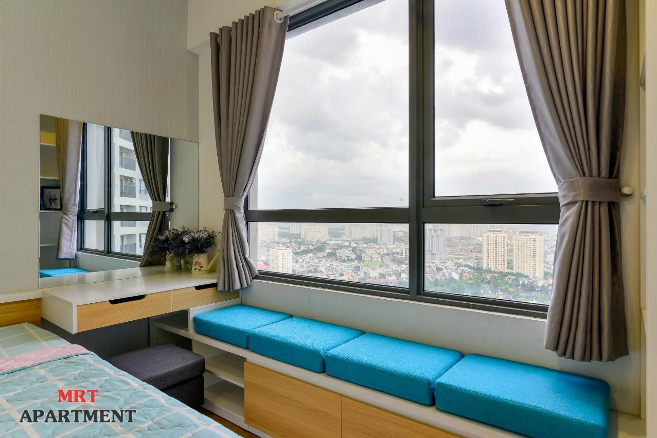 Bed in MRT Apartment In Masteri Thao Dien