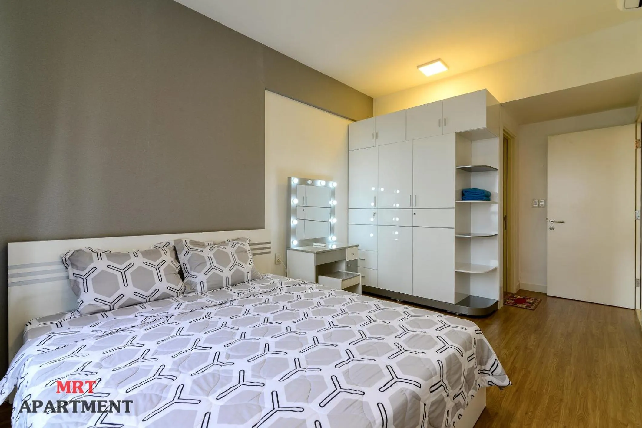 Bed in MRT Apartment In Masteri Thao Dien