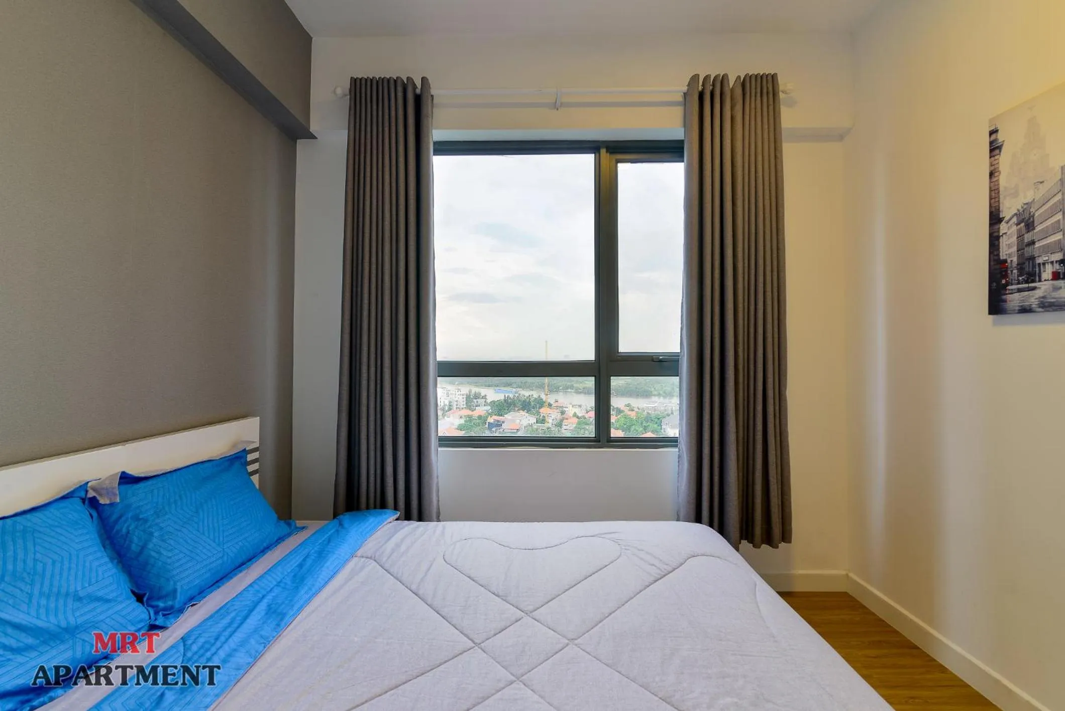 Bed in MRT Apartment In Masteri Thao Dien